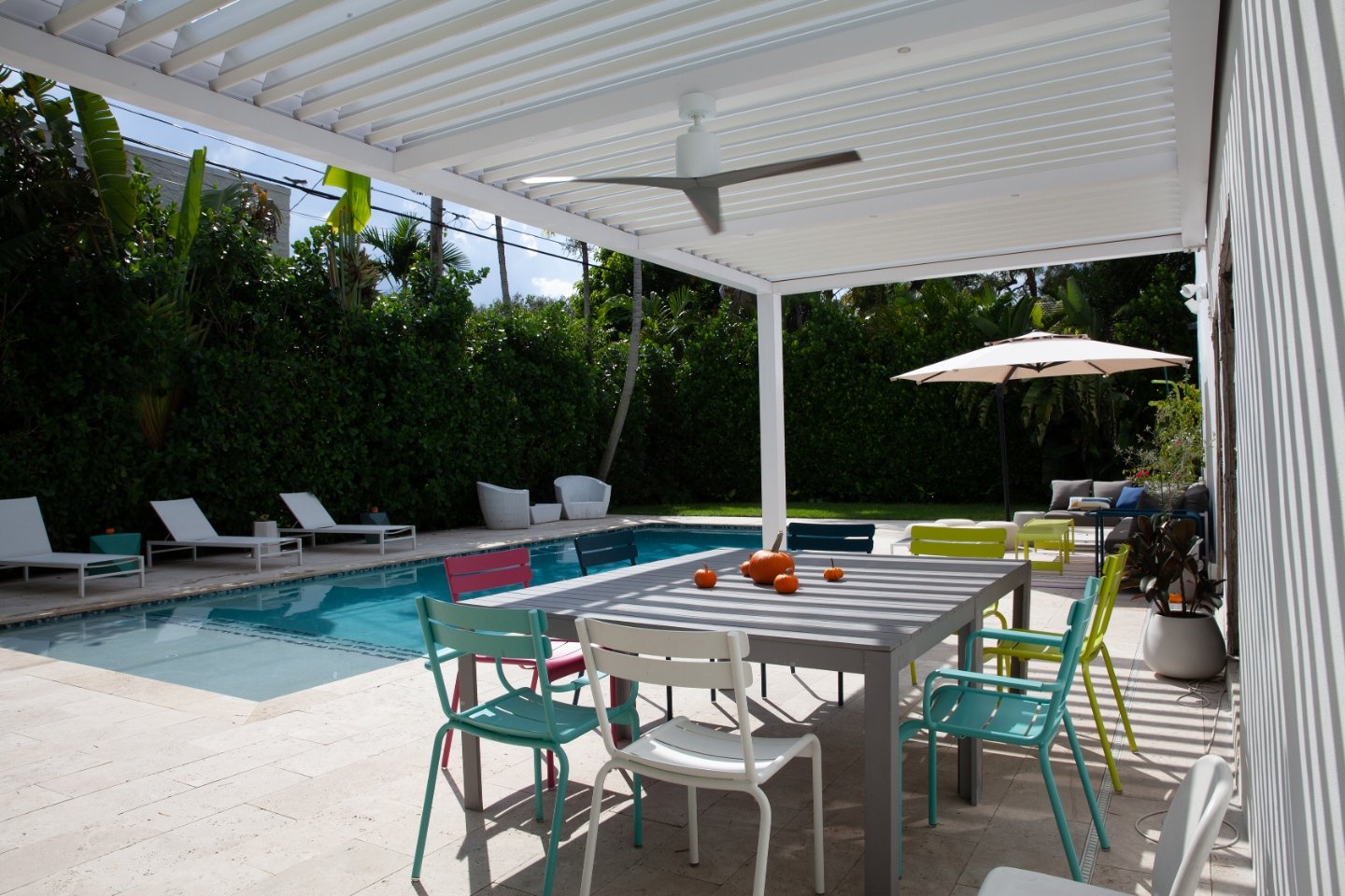 Paver patio with louvered pergola in Dix Hills, NY