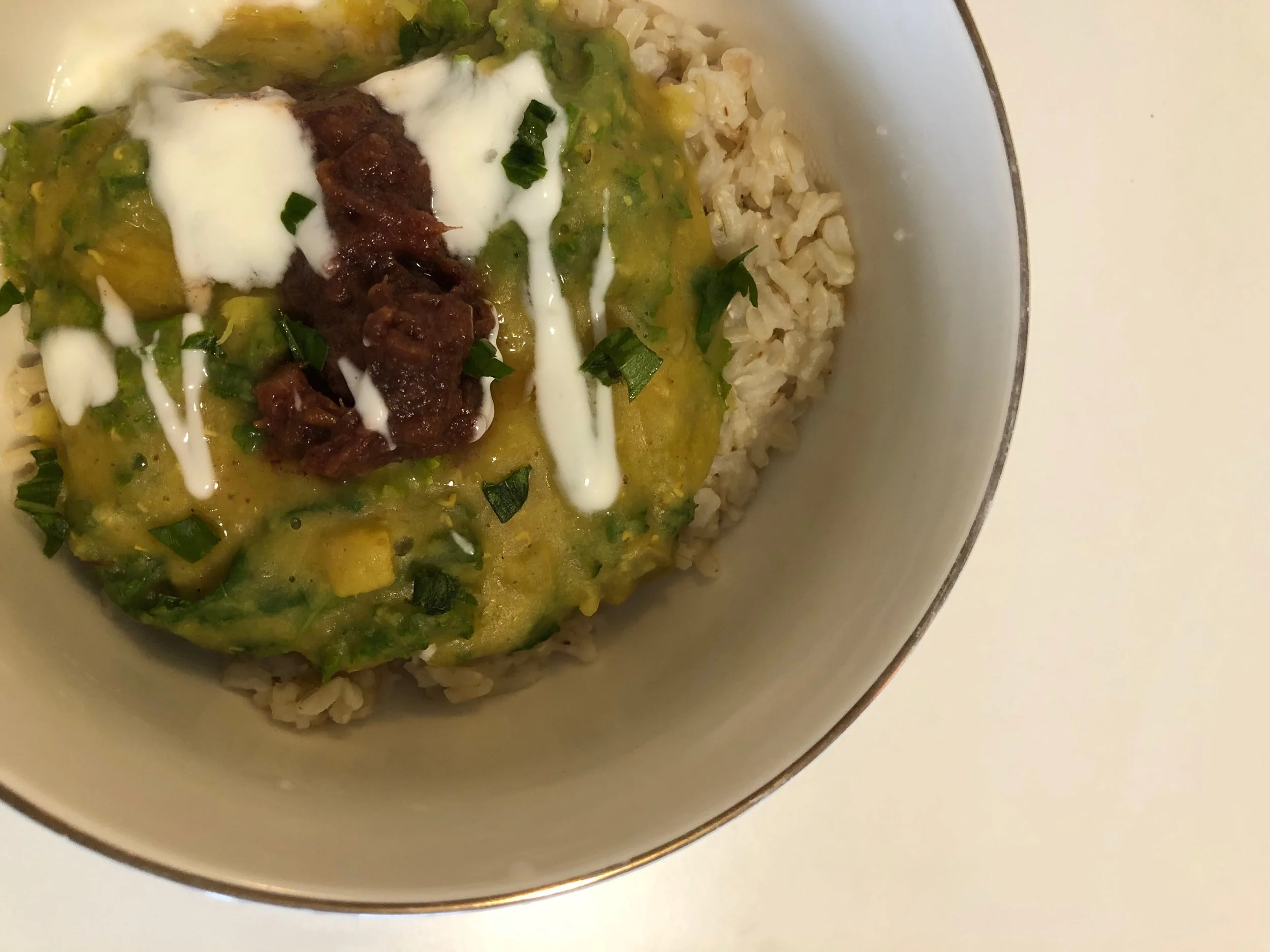 Kichidi topped with date chutney, requiring dates, tamarind concentrate and spices. Recipes: Padma Lakshmi