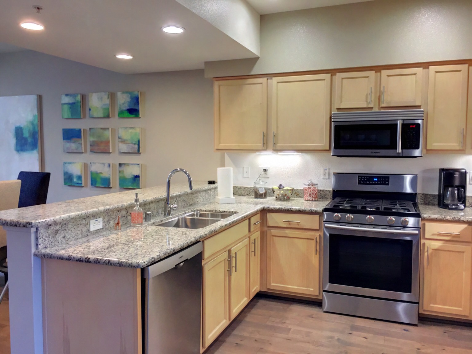 Kitchen bar offers additional seating.