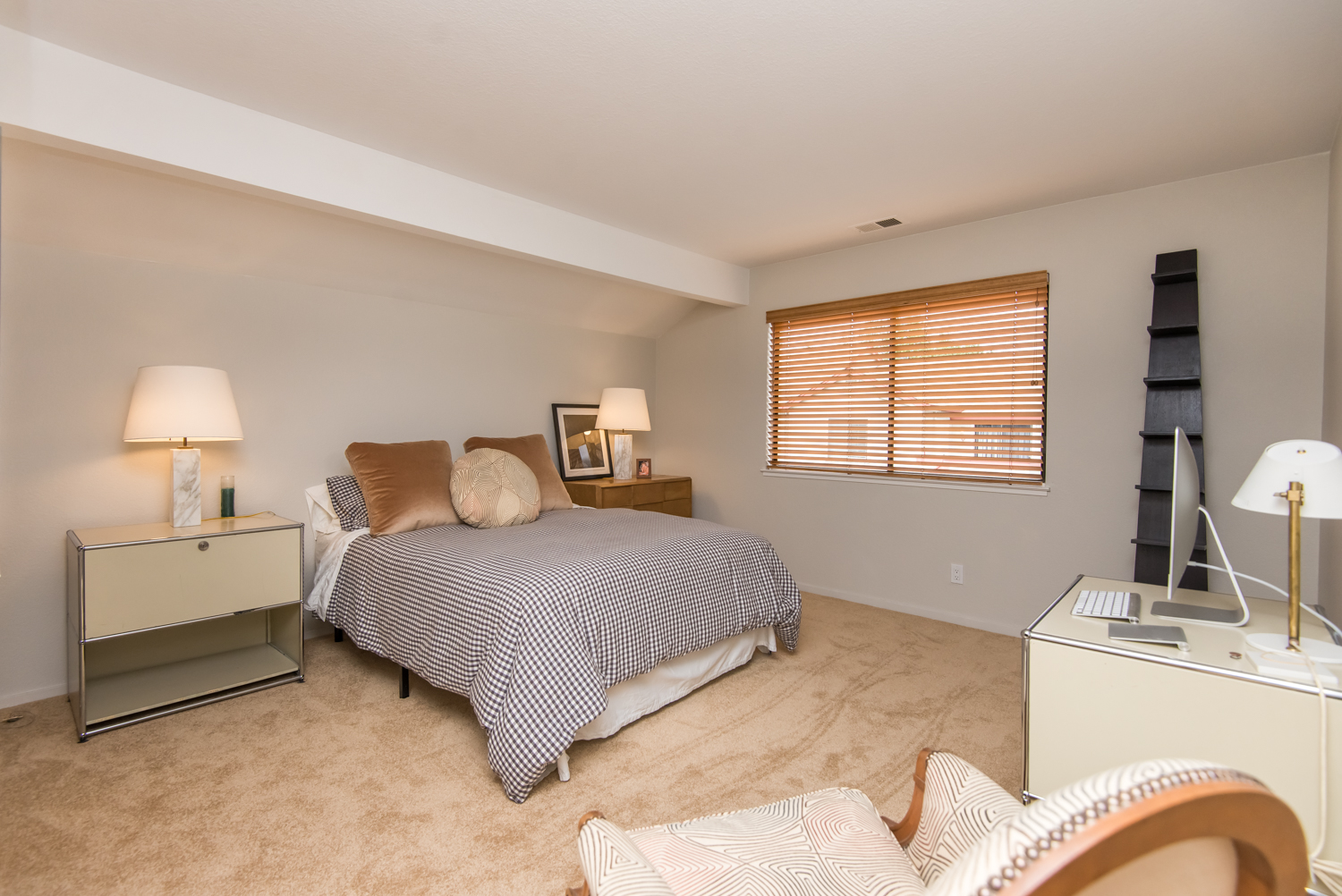 Nice sized master bedroom with new carpet.