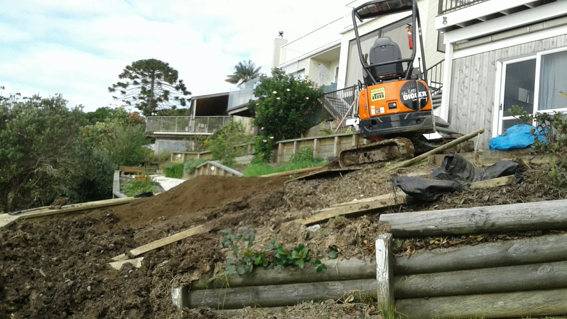 The Little Digger navigating a tight space on a recent job