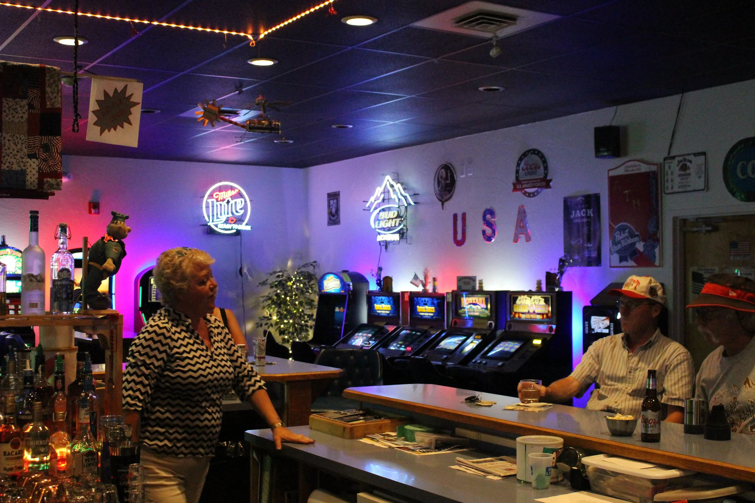 The VFW bar is dimly lit but heartily attended