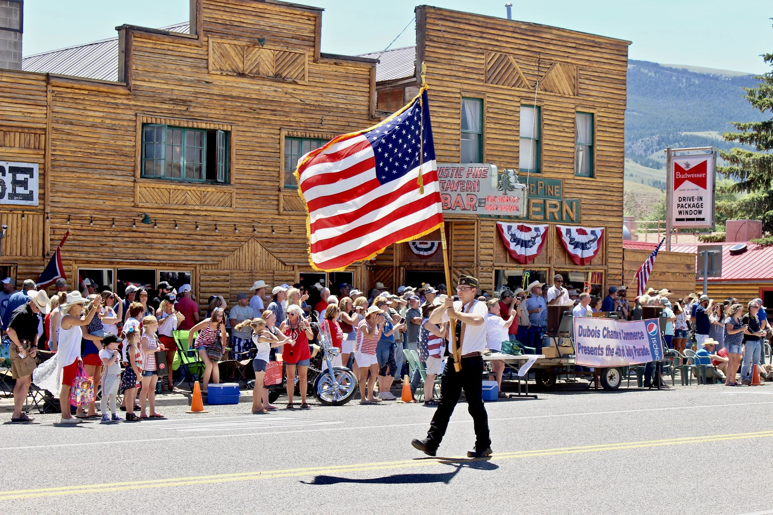 The Independence Day parade down Main St. is led by a proud Color Guard