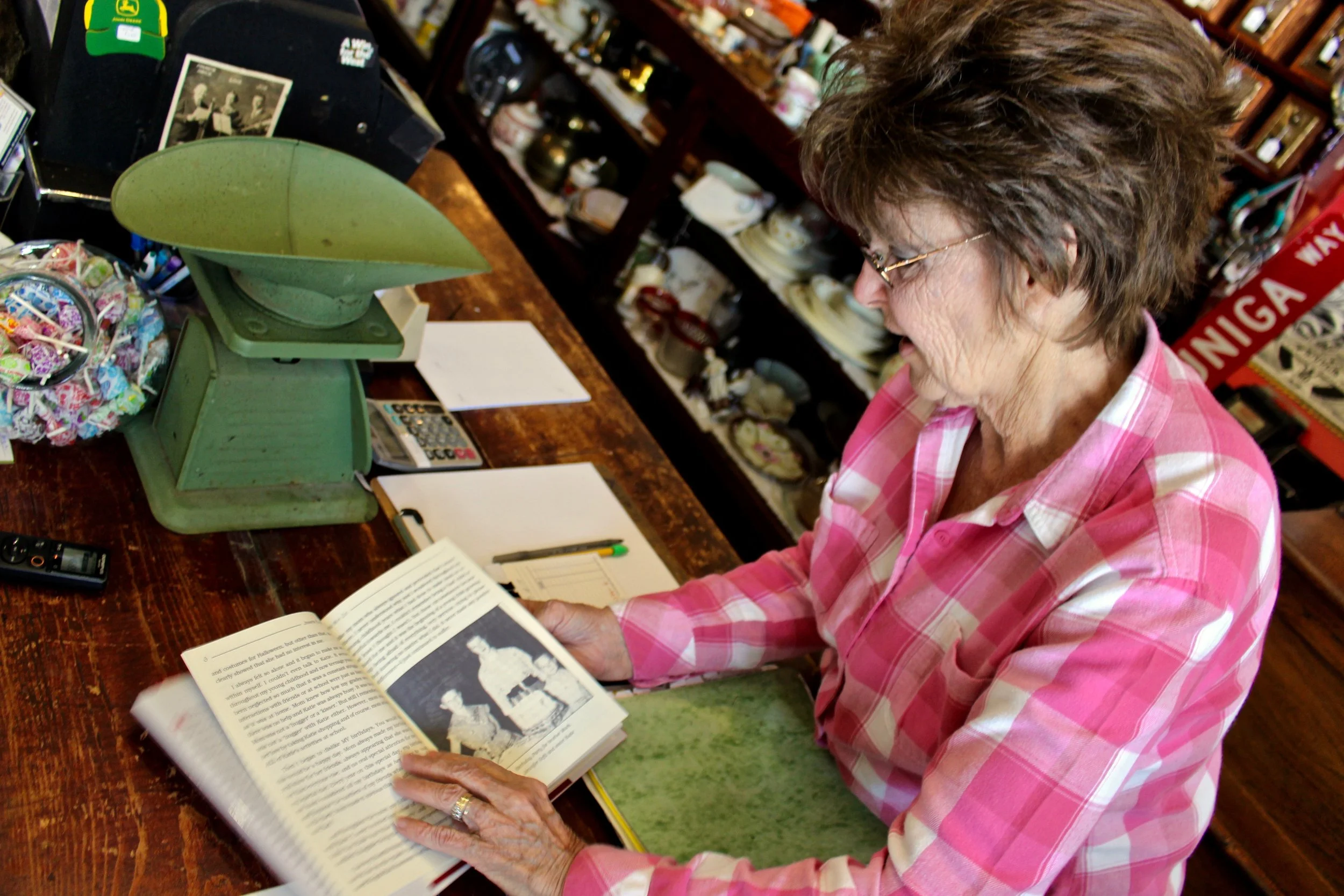 Jen leafs through her book