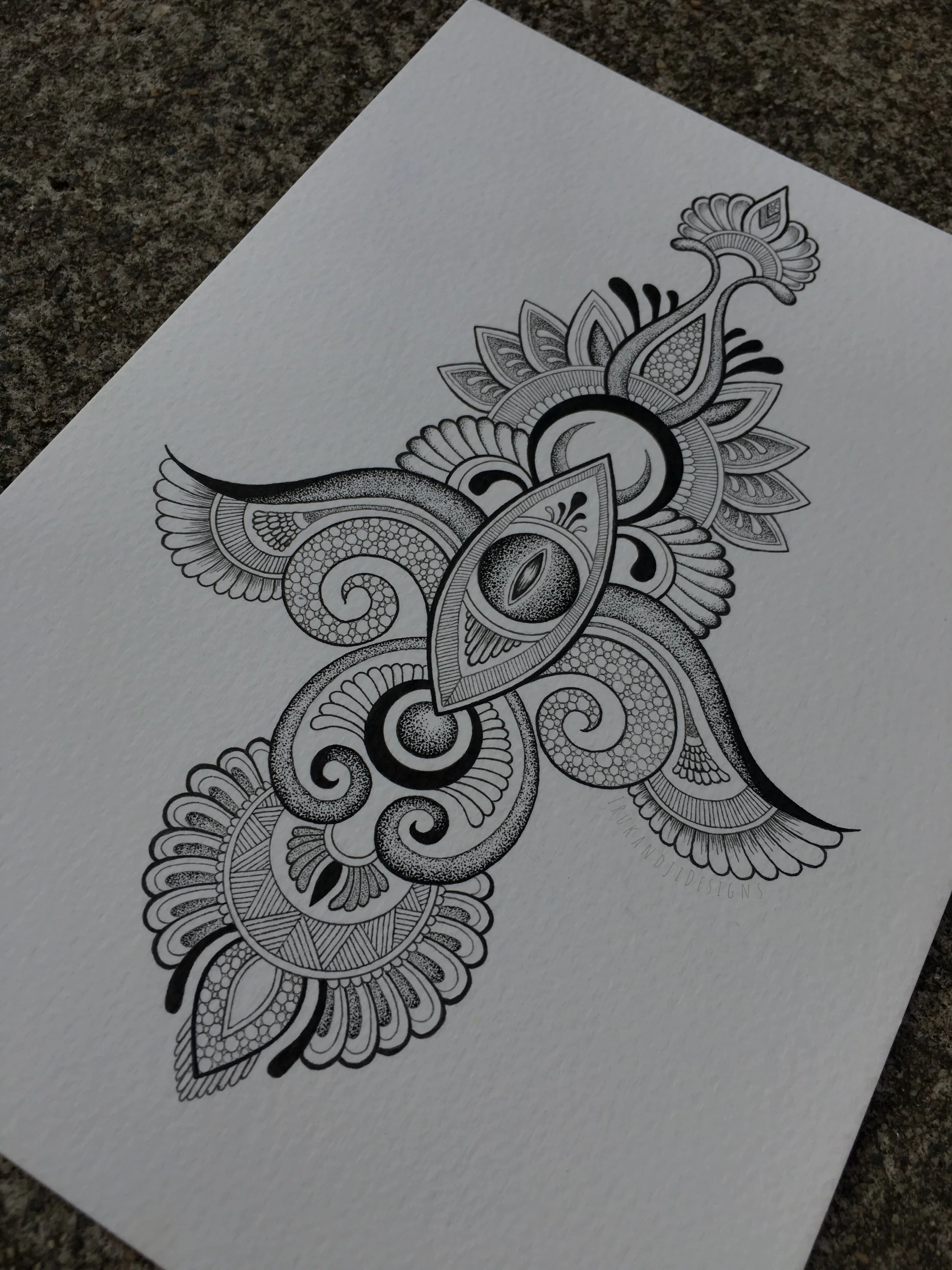 intricate mehndi style lotus eye design