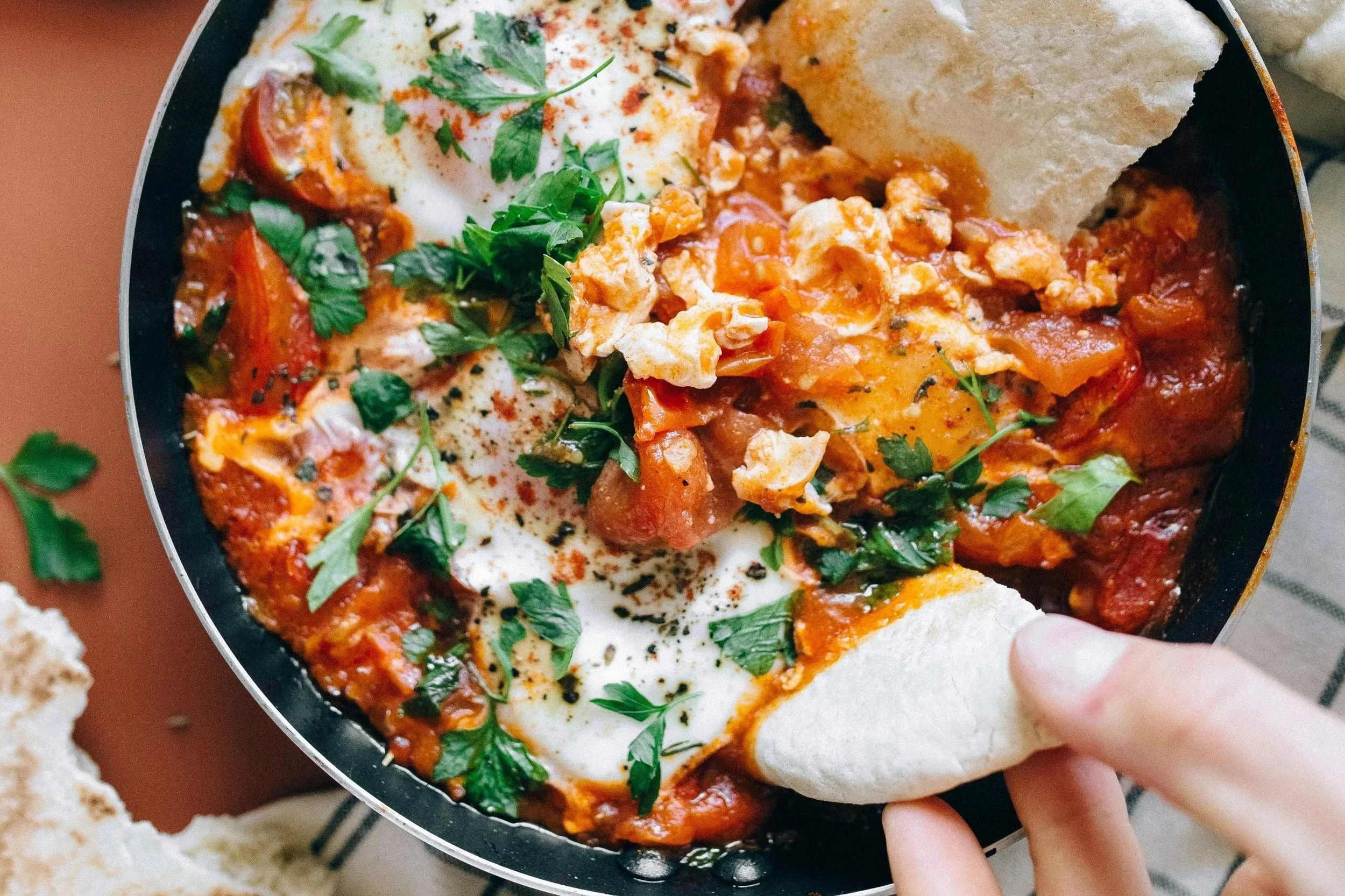 Shakshuka (Middle Eastern style Baked Eggs)