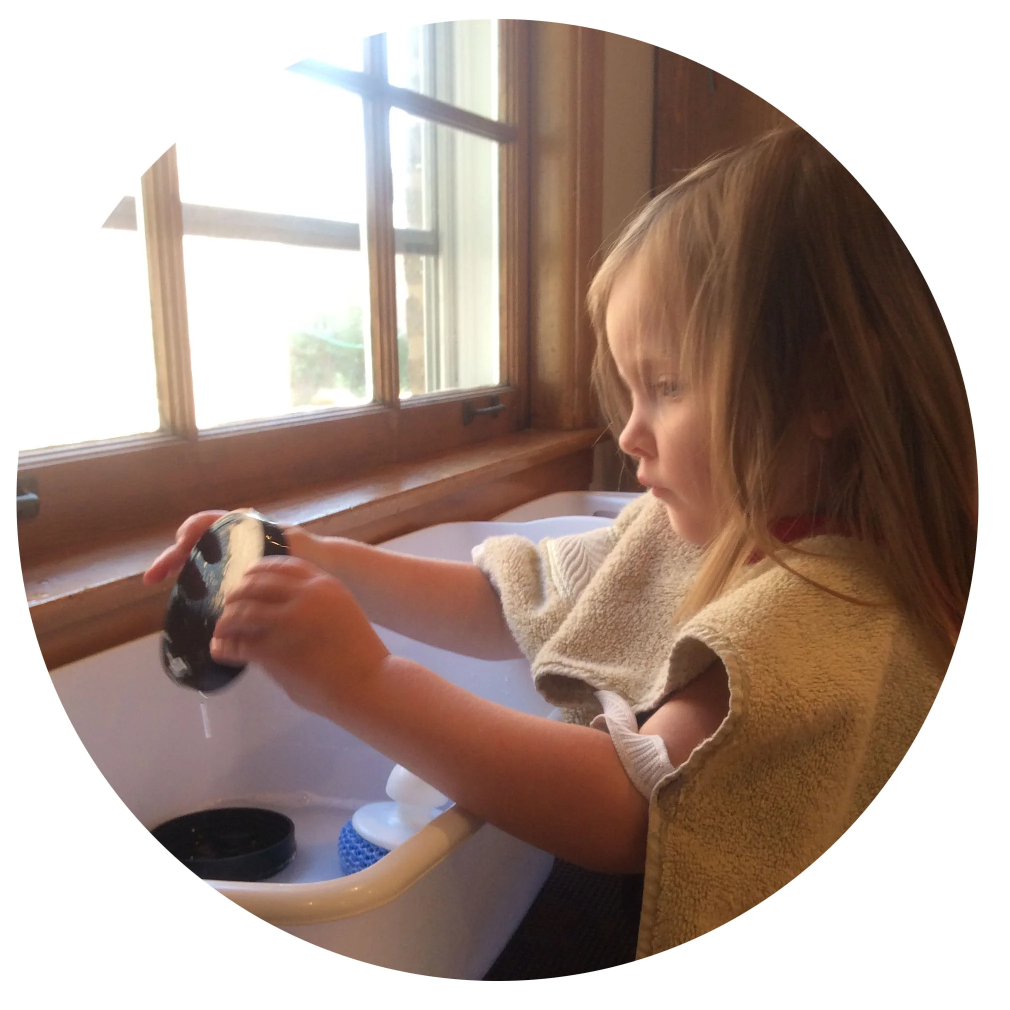 Children wash their own dishes every day and are offered the opportunity to practice this life skill regularly. 