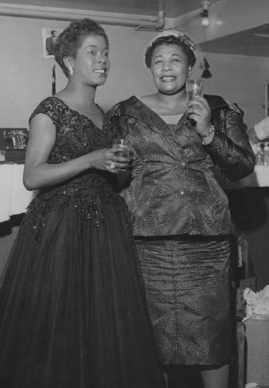 Sarah Vaughan (left) & Ella Fitzgerald
