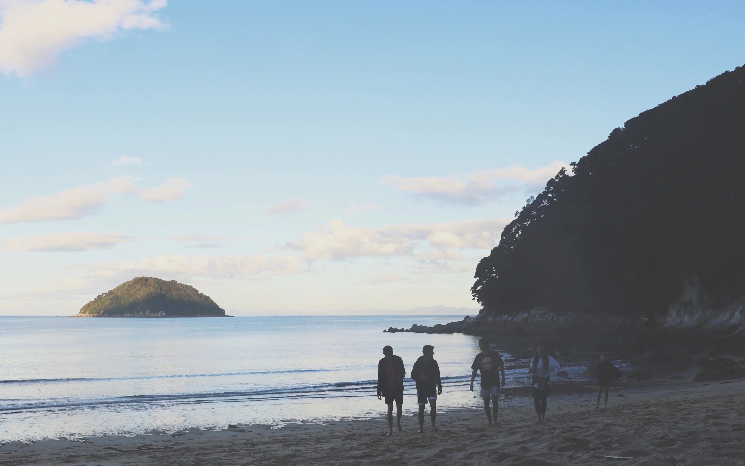 After drifting off very early (around 6.30pm) to drizzly rain, our spirits were high when we woke to blue skies. Knowing we only had a 6km walk to Onetahui Beach (a quarter of the distance we'd walked in the previous day), we started the day off at a very leisurely pace. First a swim in the sea followed by coffee, oats and a good hour reading in the sun. We eventually packed up the tents, tidied the campsite and farewelled the neighbours to start the short walk to our next spot.