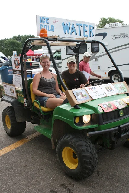 OBOH SUPPORTERS JANELLE SWAGER AND JENNI BULLOCK SELLING WATER ON ONE OF TWO OBOH GATORS.