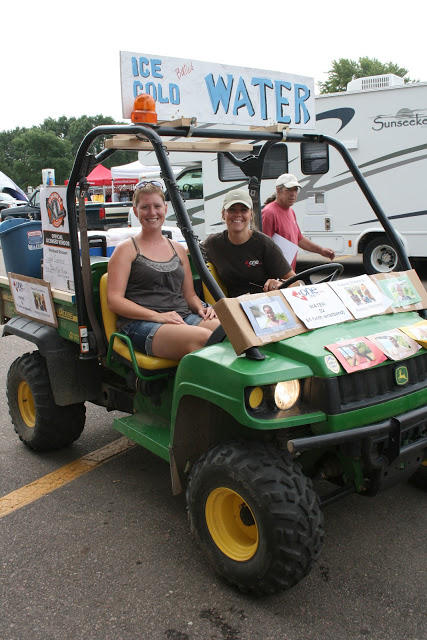 OBOH SUPPORTERS JANELLE SWAGER AND JENNI BULLOCK SELLING WATER ON ONE OF TWO OBOH GATORS.