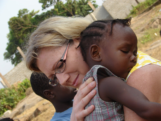  Jana with one of the caretaker's kids. 