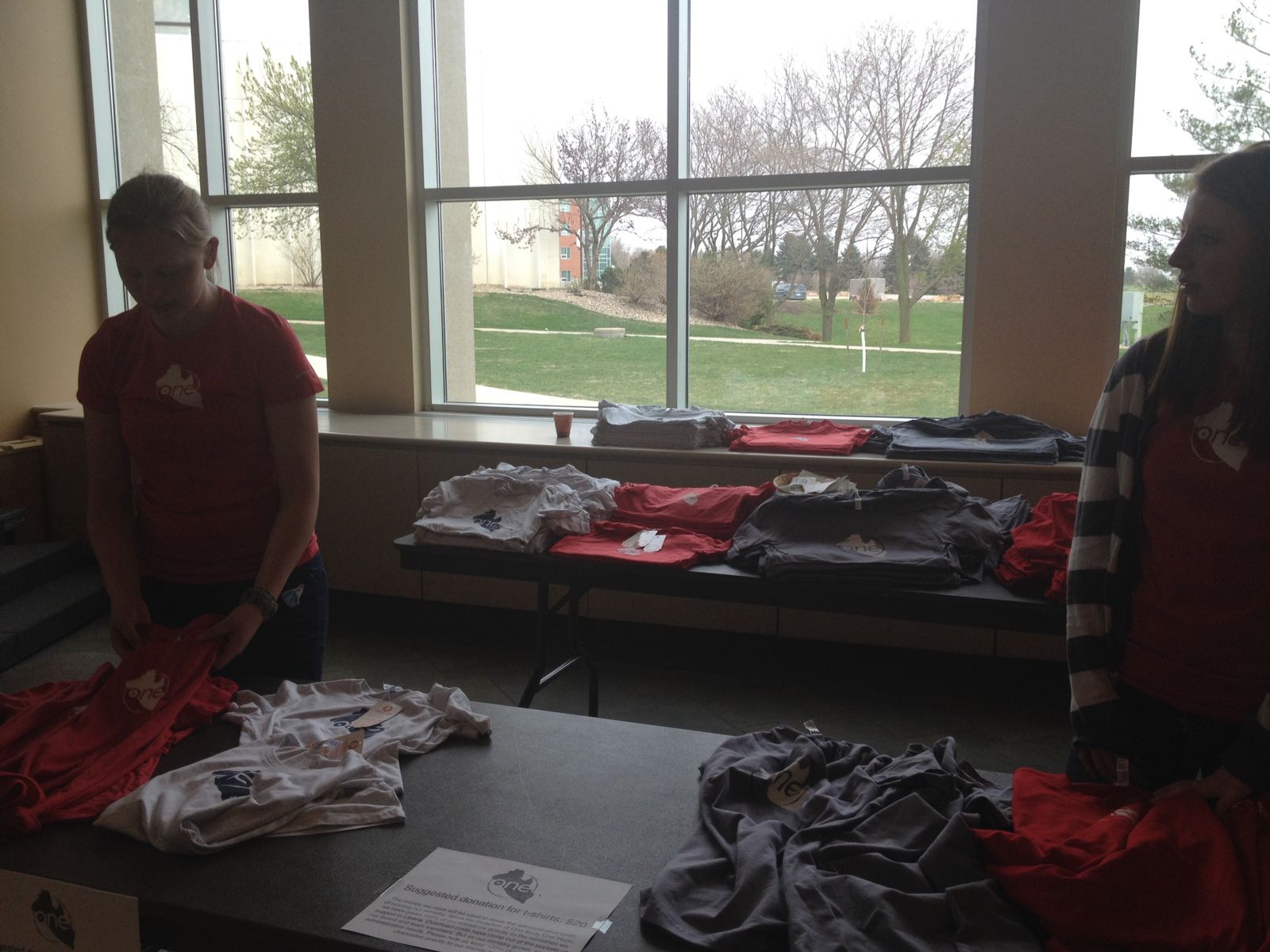 Preparing the t-shirt displays to help cover administration costs, so all donations can go directly to our sister community.