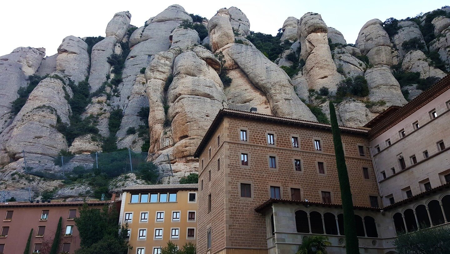 This monastery and surrounding buildings are tucked away in these mountains. ⛰️🙃