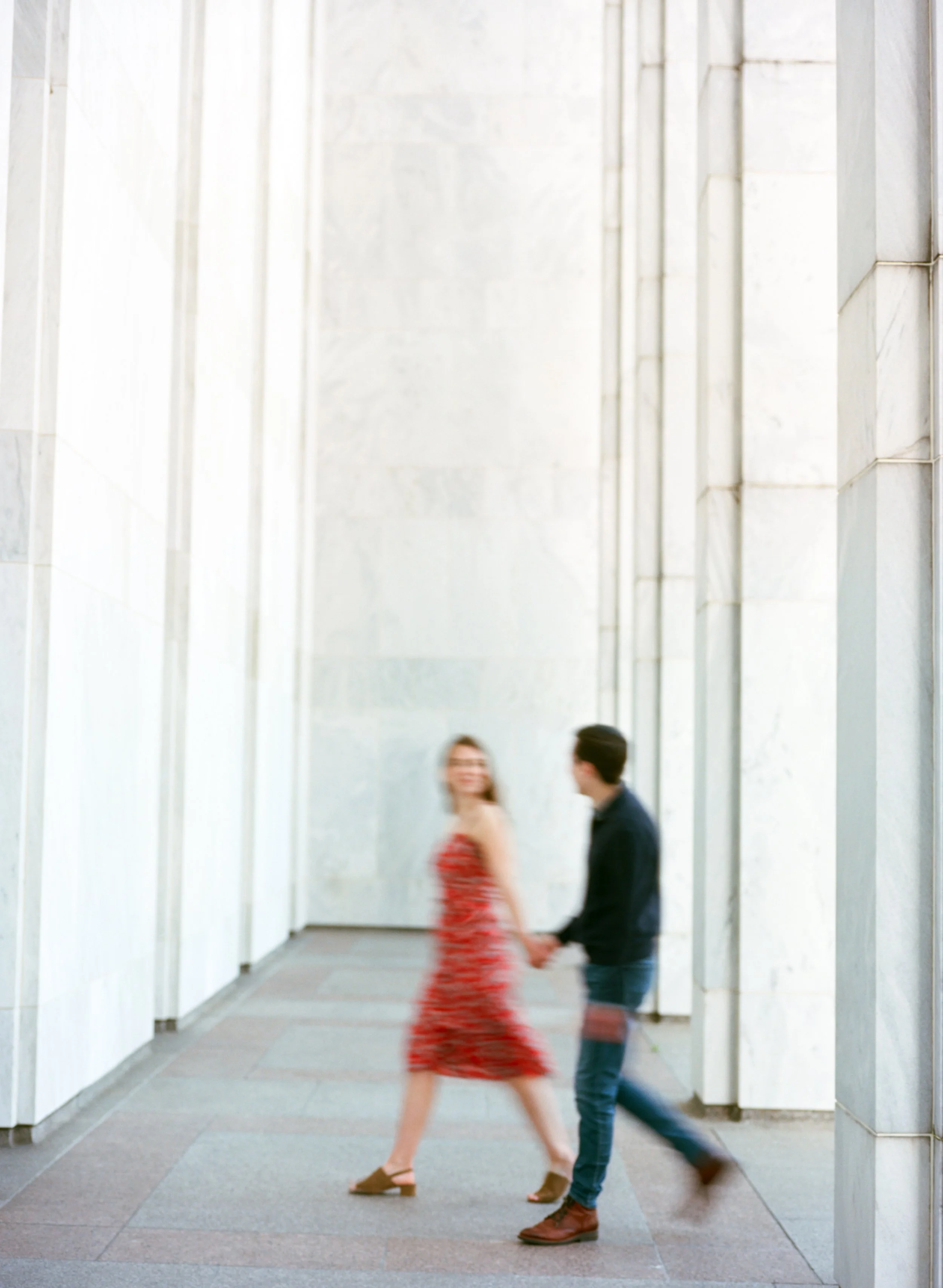 Long exposure walking couple on film photography