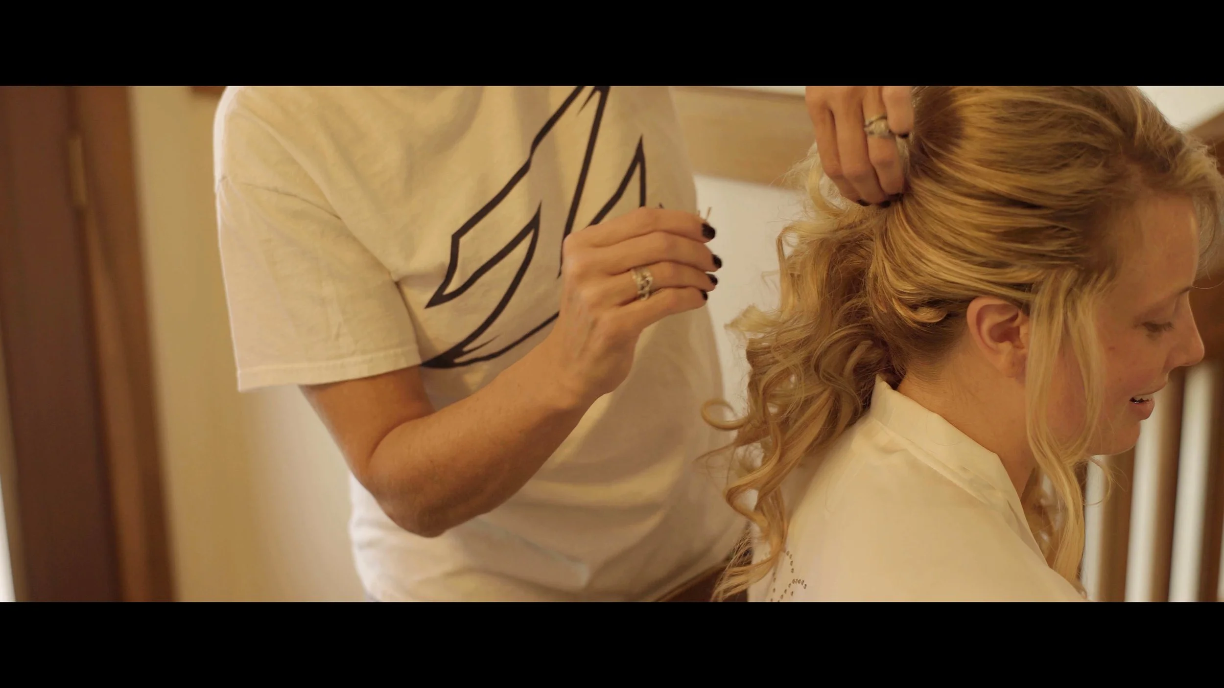 Bride getting her hair done in bad light.