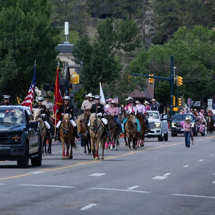 Walk in the Rooftop Rodeo Parade in Estes Park