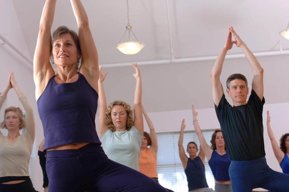 Yoga middle aged men women.jpg