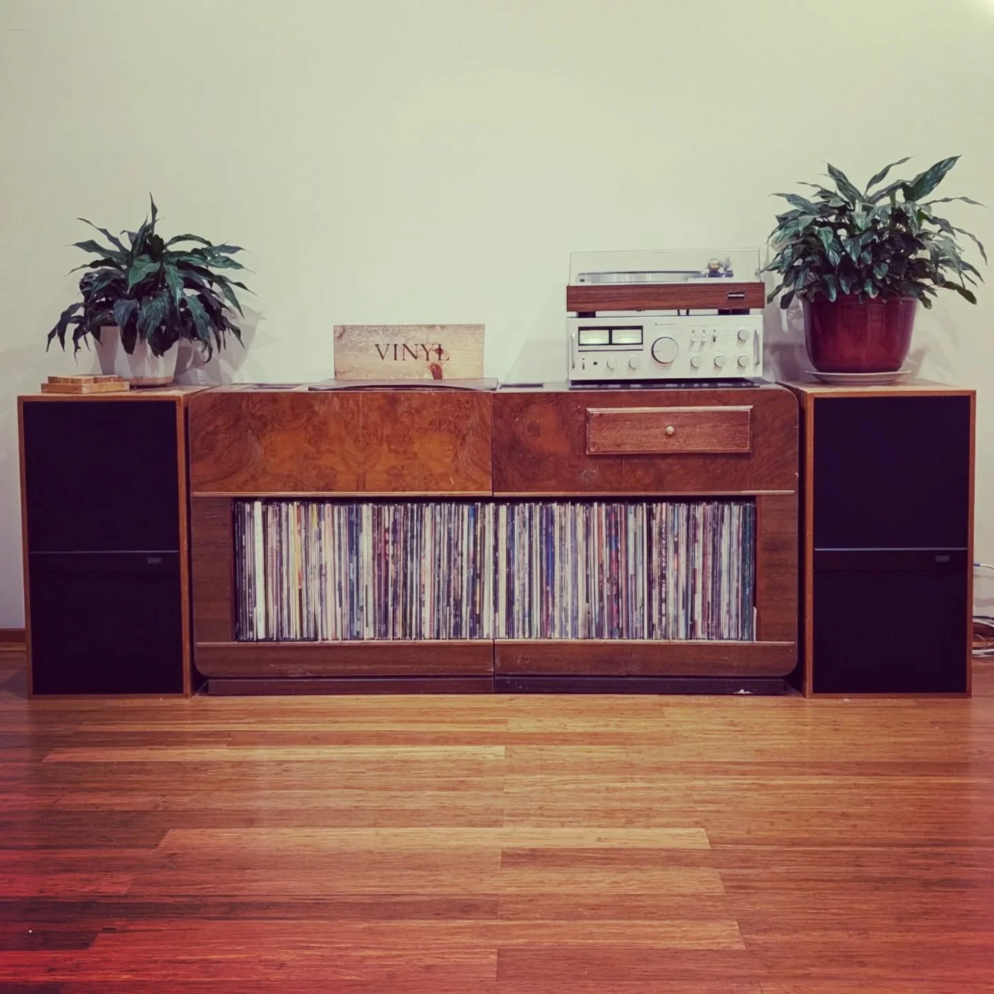 Years ago I was gifted an old 1949 HMV (His Master's Voice) Radiogram. The electronics were beyond repair so I gutted the internals and decided to convert it into a retro-looking vinyl record player unit.
.
Where the speaker cloth sat, I widened the 