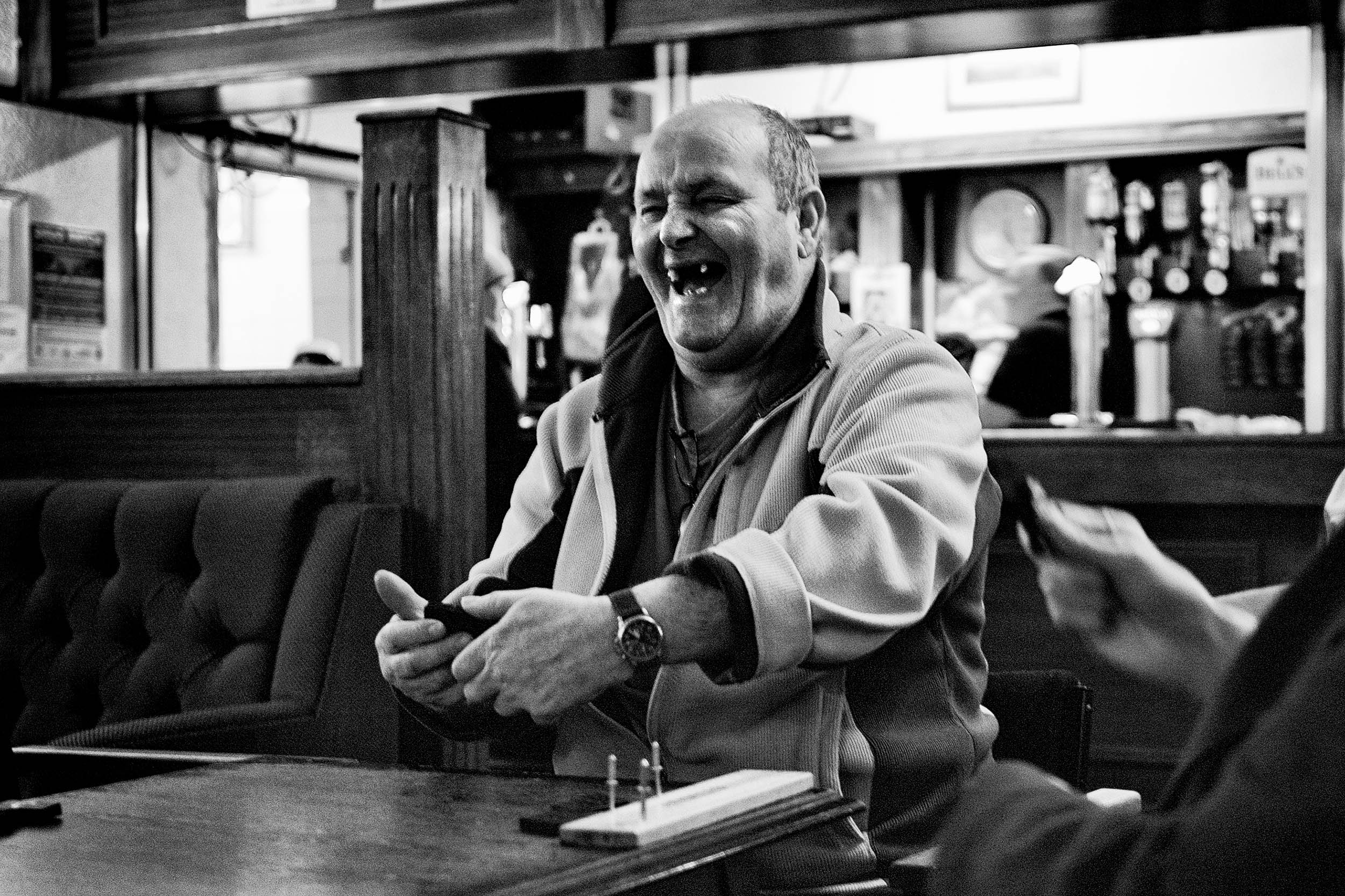 Game of dominoes in the Jaguar Land Rover workers' social club in Birmingham, UK