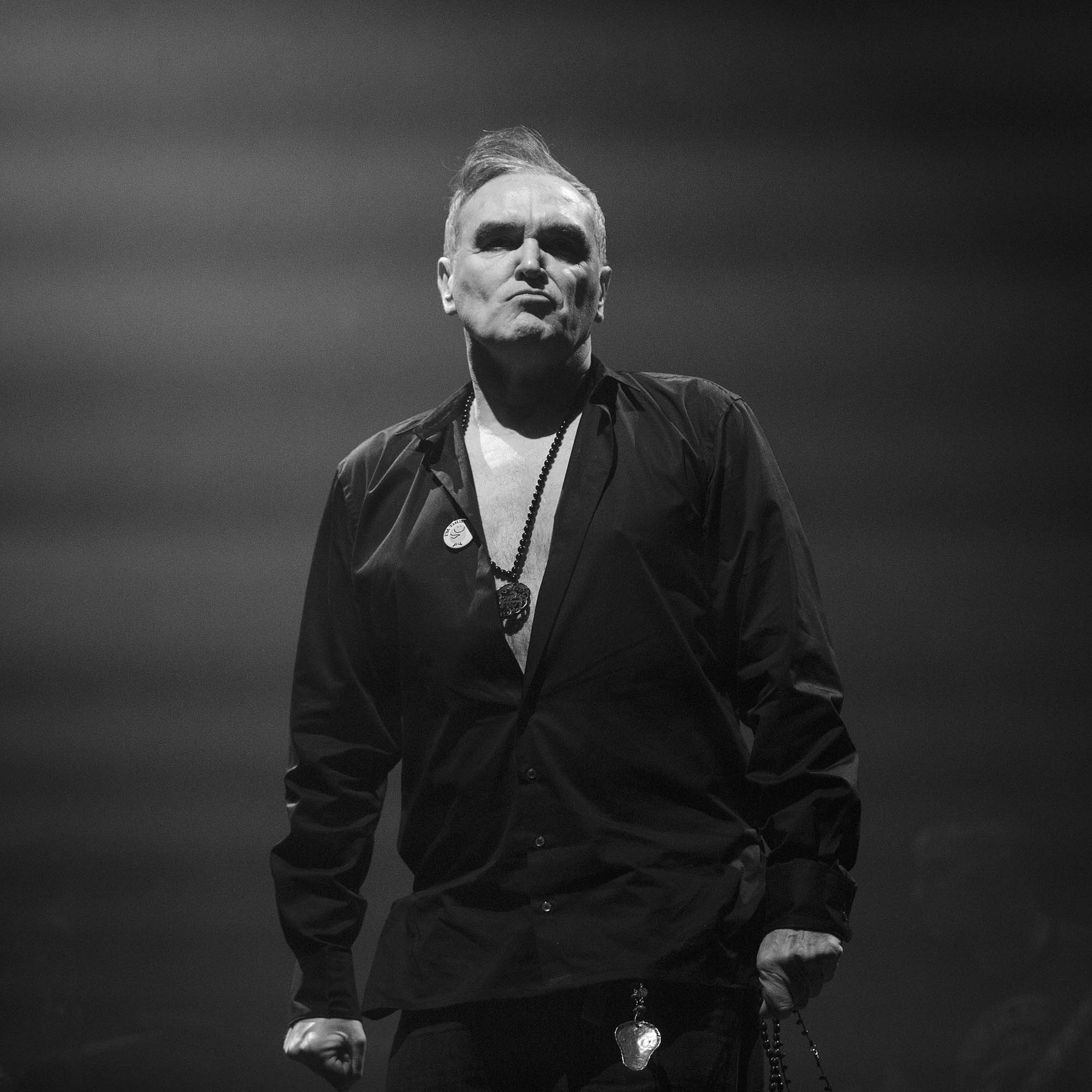  Morrissey scowls at the audience as he walks on stage at the NEC, Birmingham 