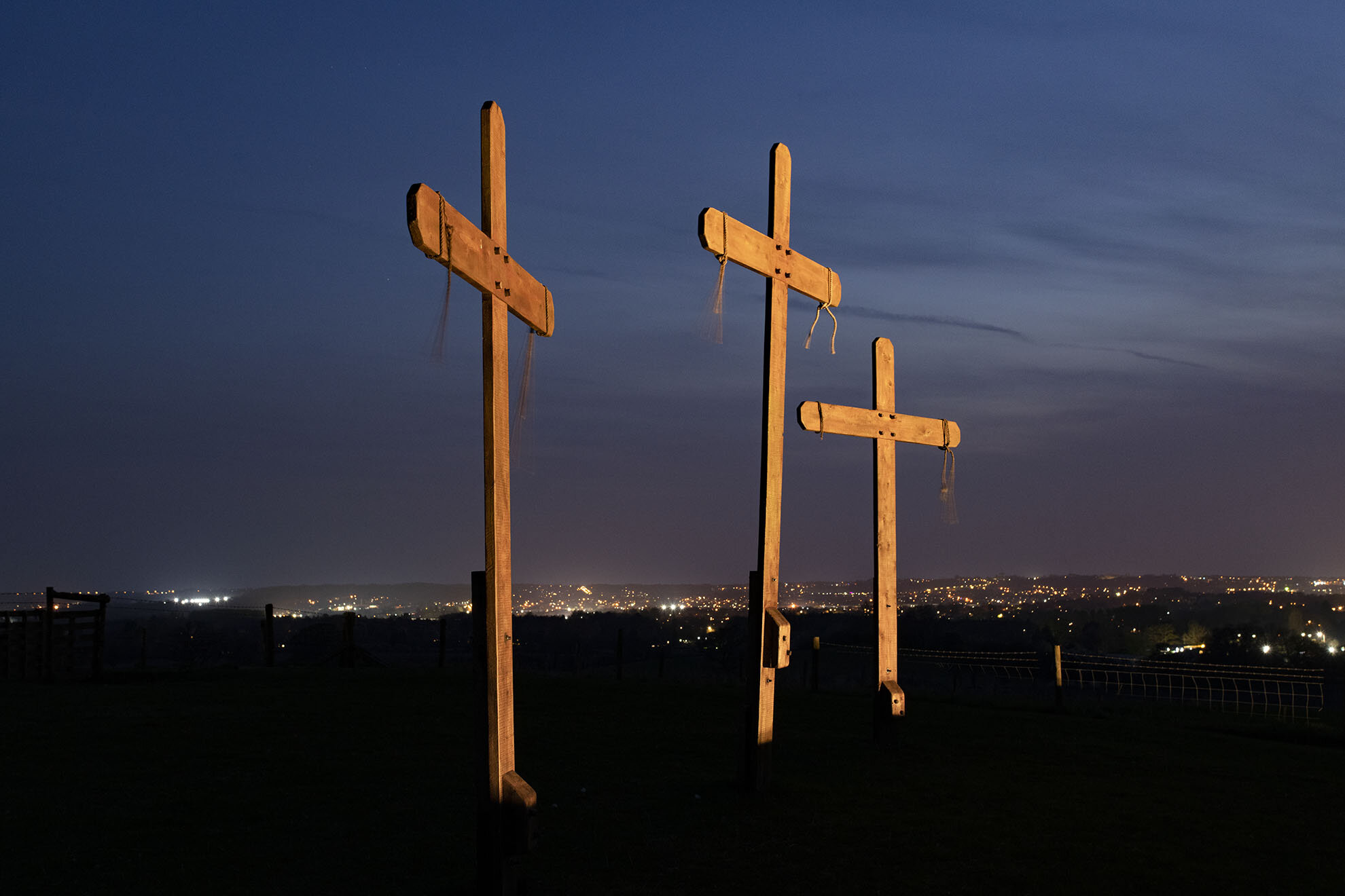 Three crucifixes stand on a hill overlooking the town of Redditch in Worcestershire. Every Easter, a local landowner puts them in place to mark Holy Week.