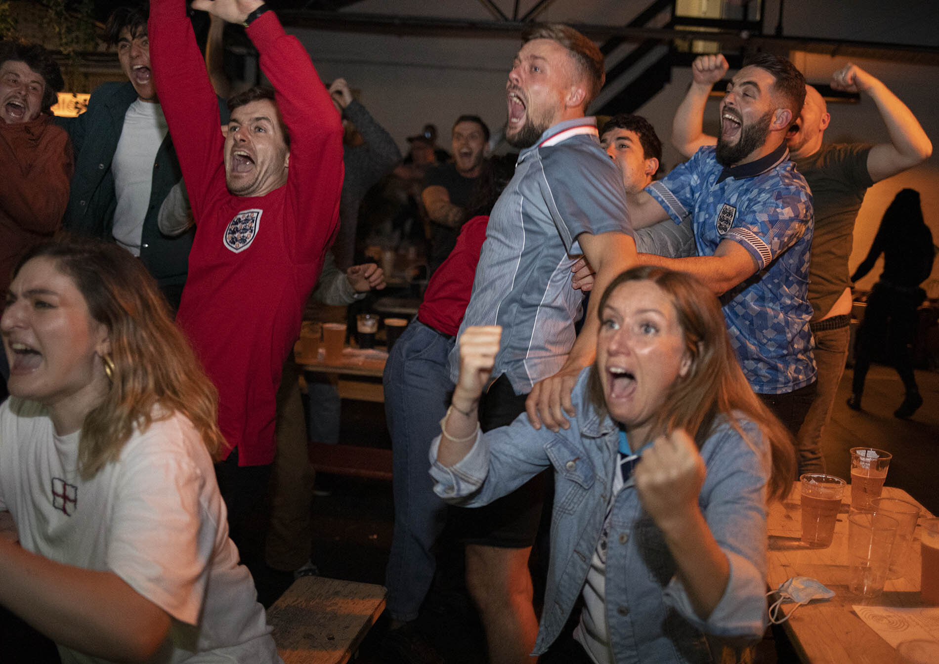 England fans celebrate the final whistle after beating Denmark in the Euro 2020 semi-final.