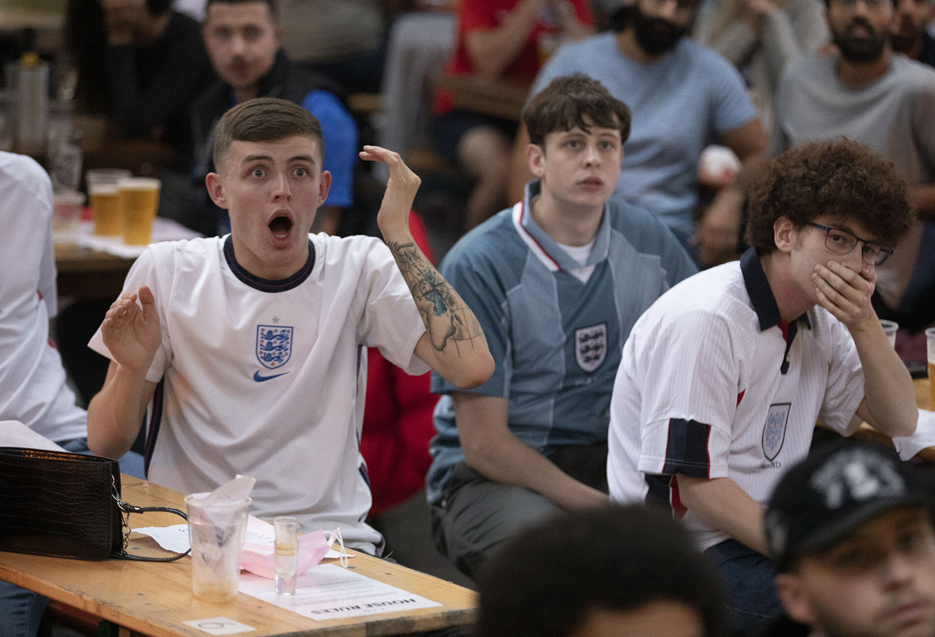 England fans in shock after Denmark’s goal in the Euro 2020 semi-final.