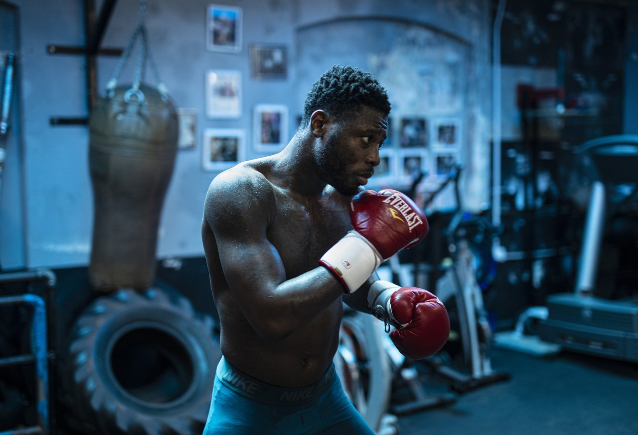 Boxer Isaac Chamberlain in training for a cruiserweight title challenge. A drug mule at 12 years old, boxing turned his life around.