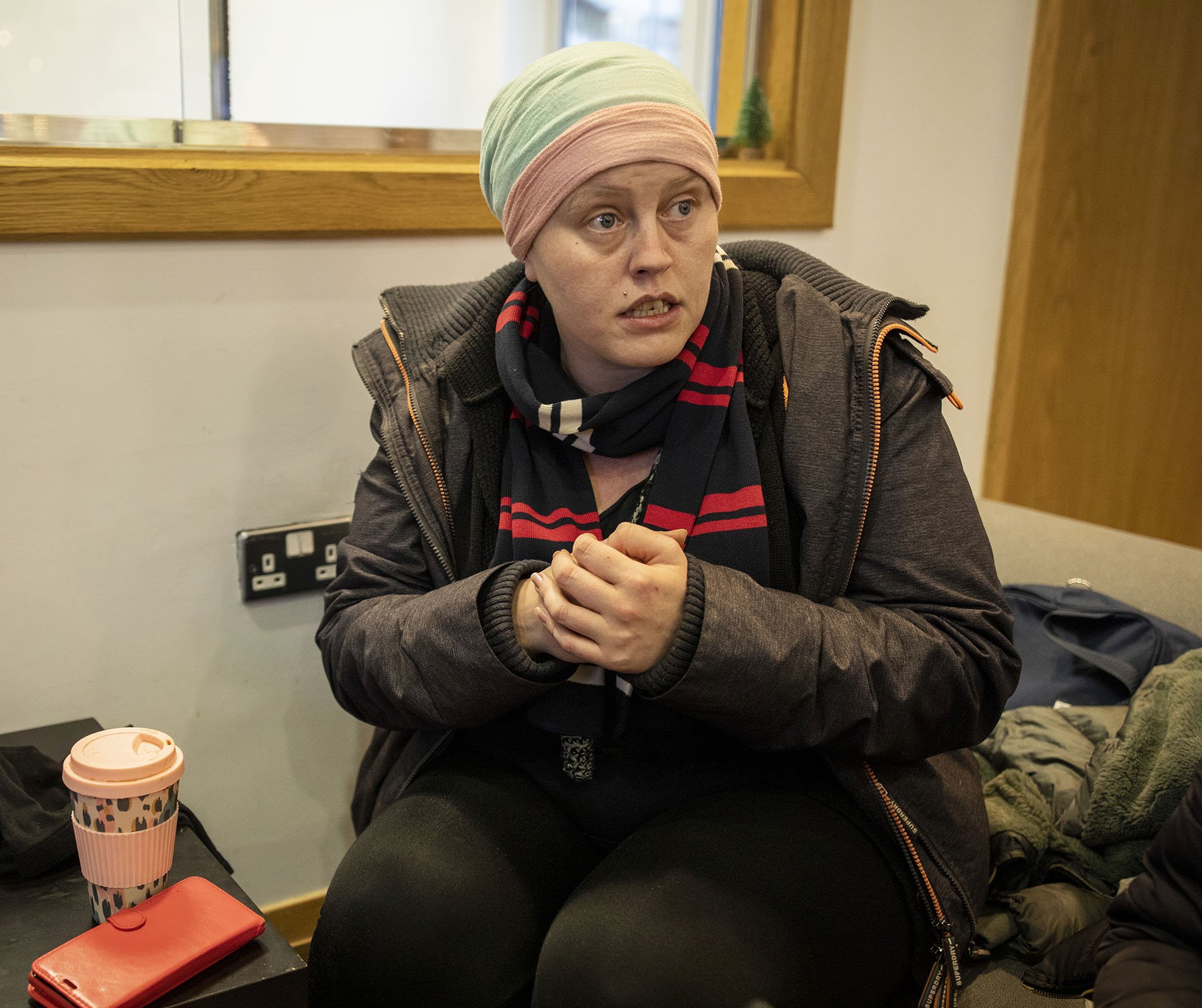 Linda in a “warm space” in Birmingham for those who struggle to pay heating bills at home. “Before discovering this place, I was living pay cheque to pay cheque and my mental health was atrocious. I feel like I’ve met my family here; I’ve come home,