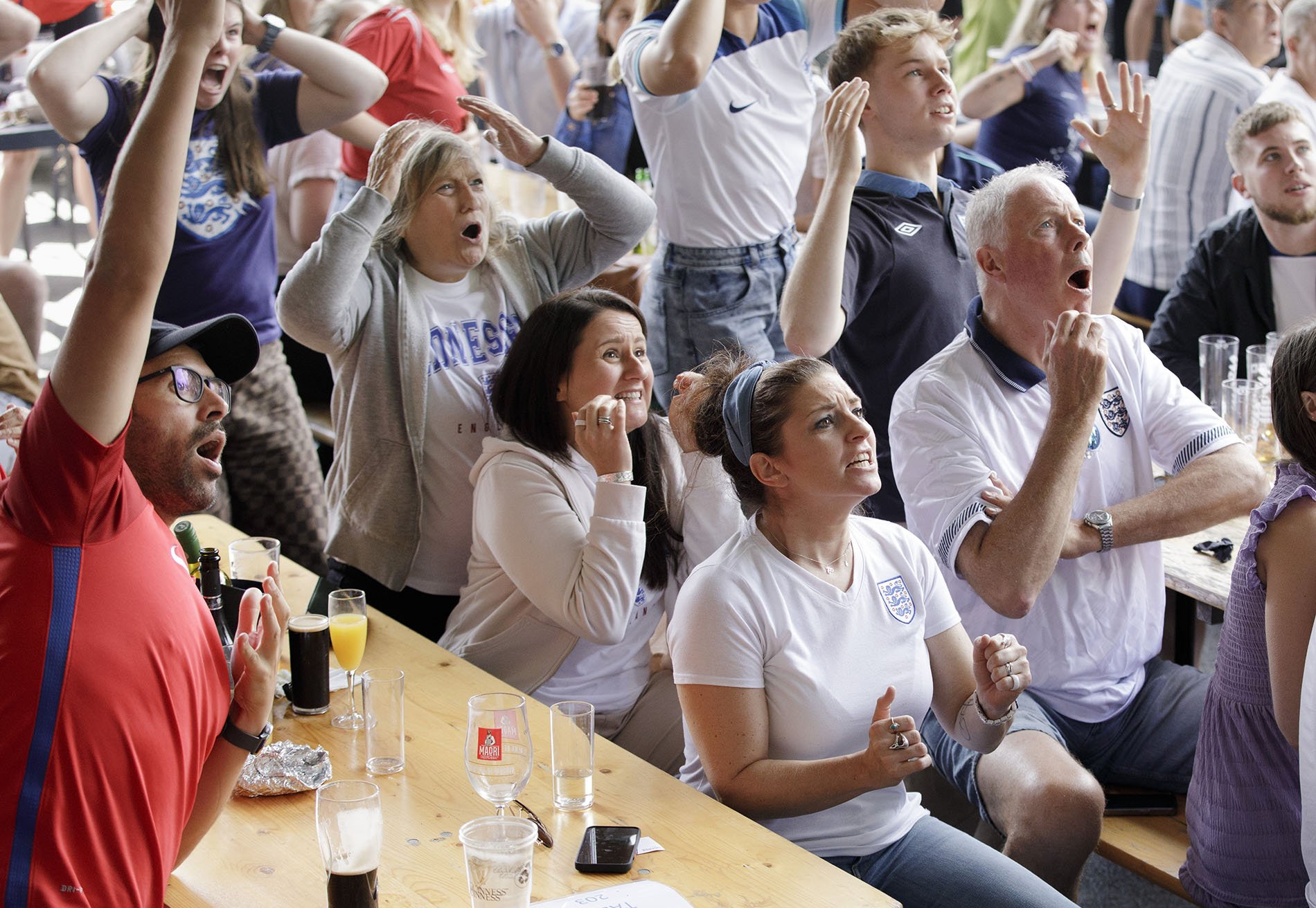 England fans at a pub in Nottingham react during the Women’s World Cup final.