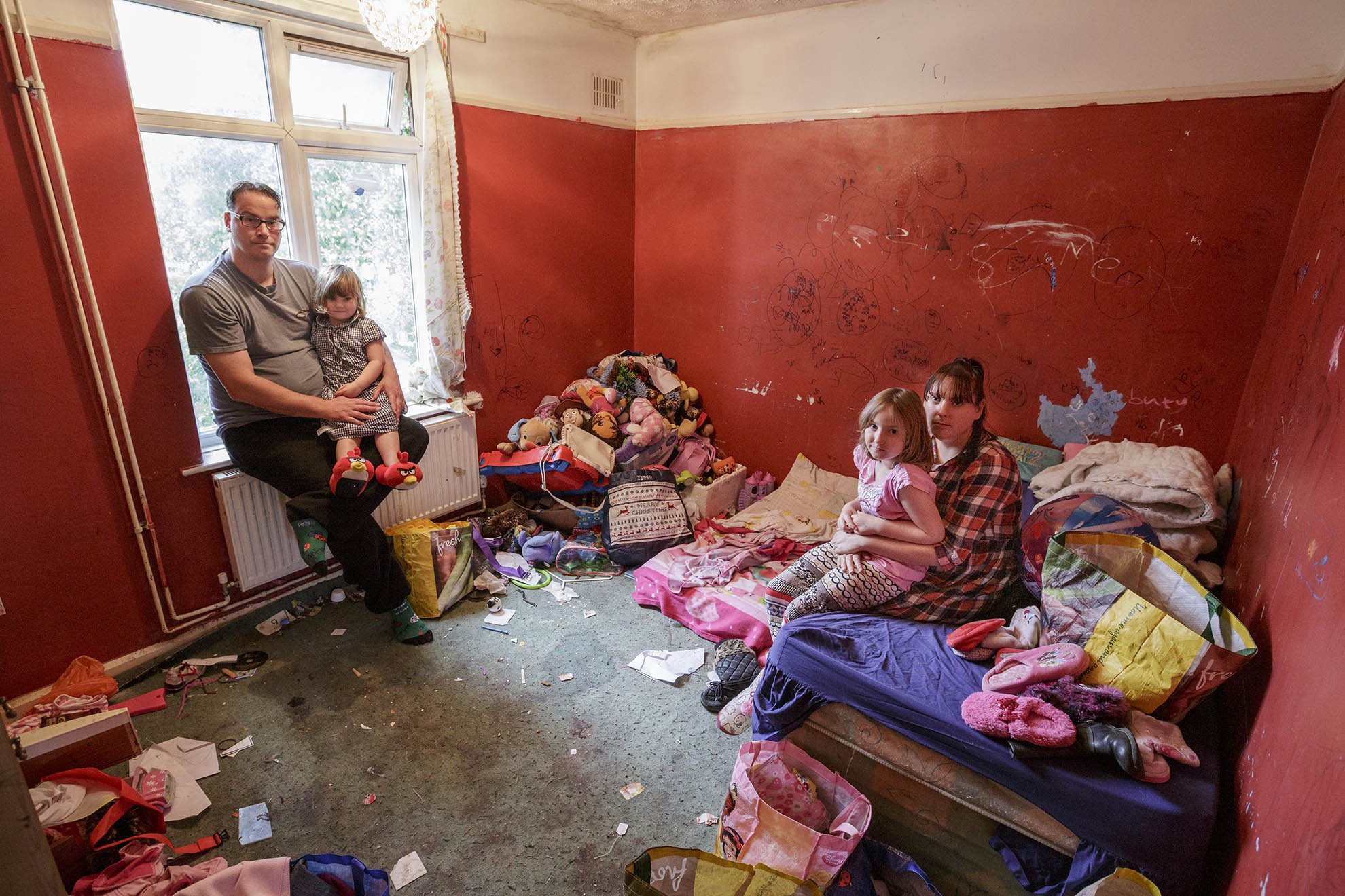  A family living in poverty in their Norfolk flat. The toys in the children’s bedroom have been donated. 