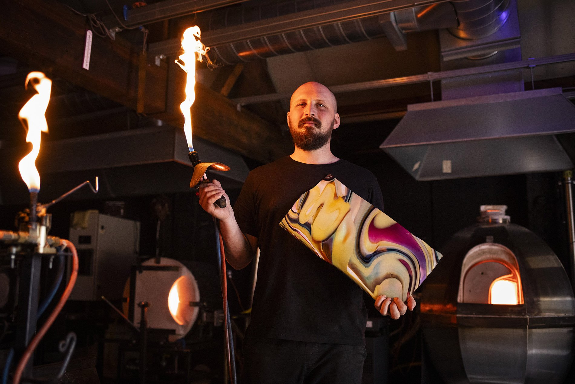 Glass blower Elliot walker. He is the only person in the UK who is hand-blowing flat glass sheets, as traditionally used in stained windows