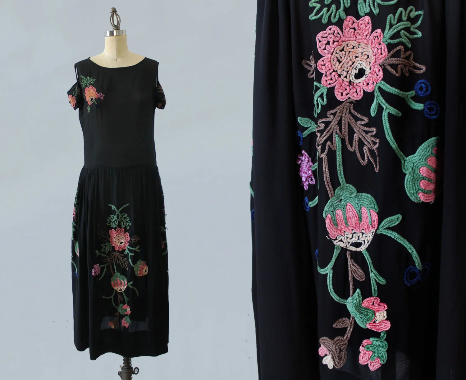Black embroidered dress with cutout shoulders. 1920s.