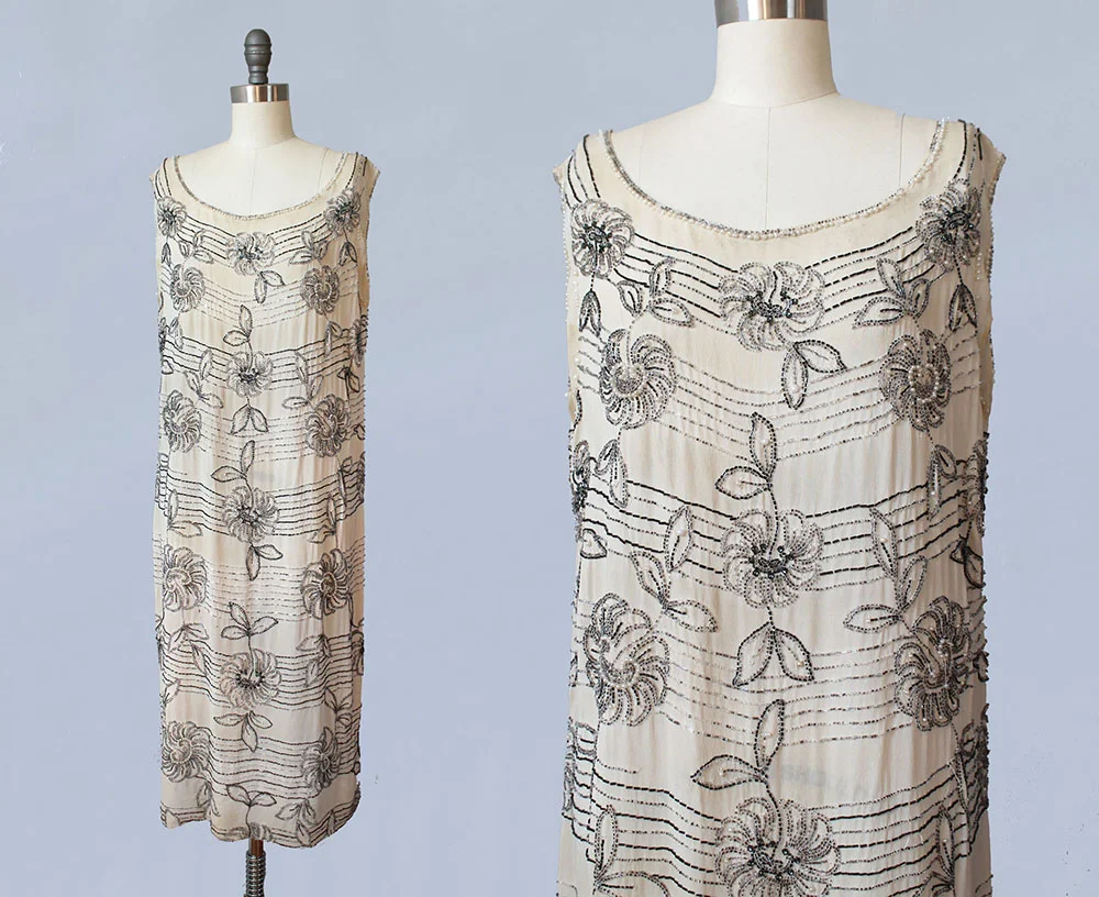Beaded dress with stripes and flowers. 1920s.