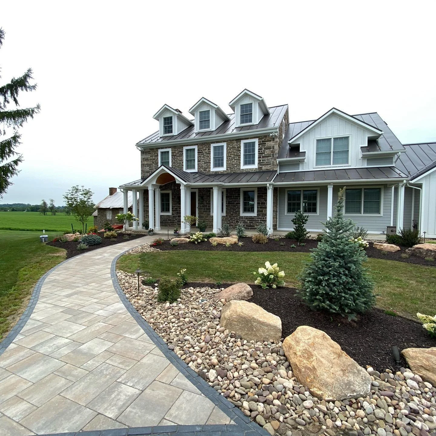 How a Landscape Designer Can Bring Your Vision for an Elegant Front Entranceway to Life in Allentown, PA