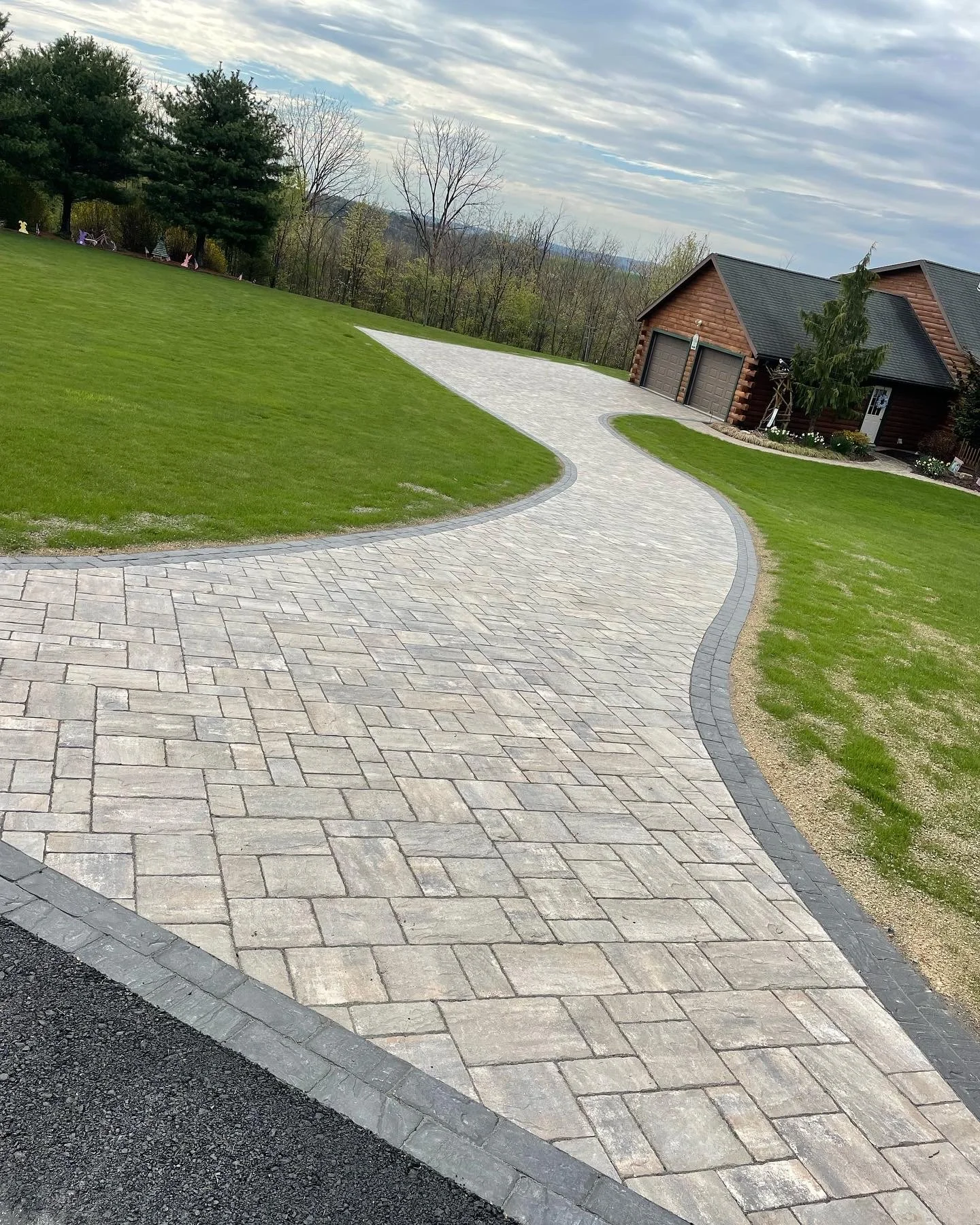 Renew a Lebanon, PA Front Landscape with a Paver Driveway and Add Shade to the Back with a Pergola