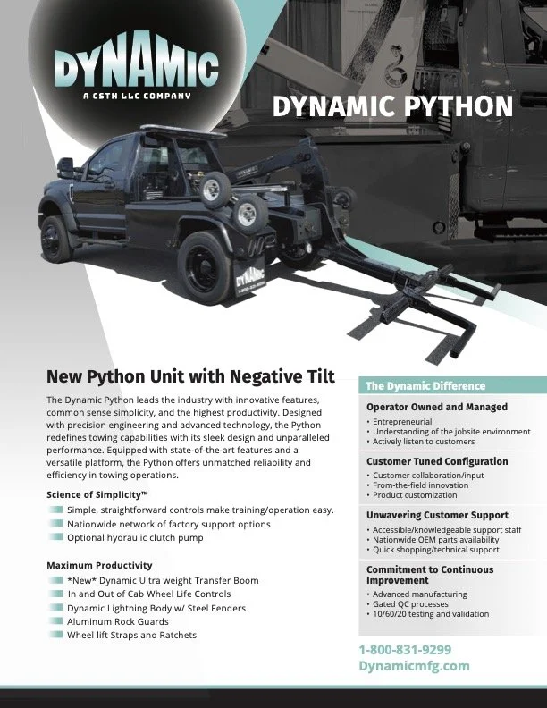 A small black tow truck with a hydraulic lift attached to a large black vehicle, on display at a promotional event for Dynamic Python, a company specializing in towing technology.