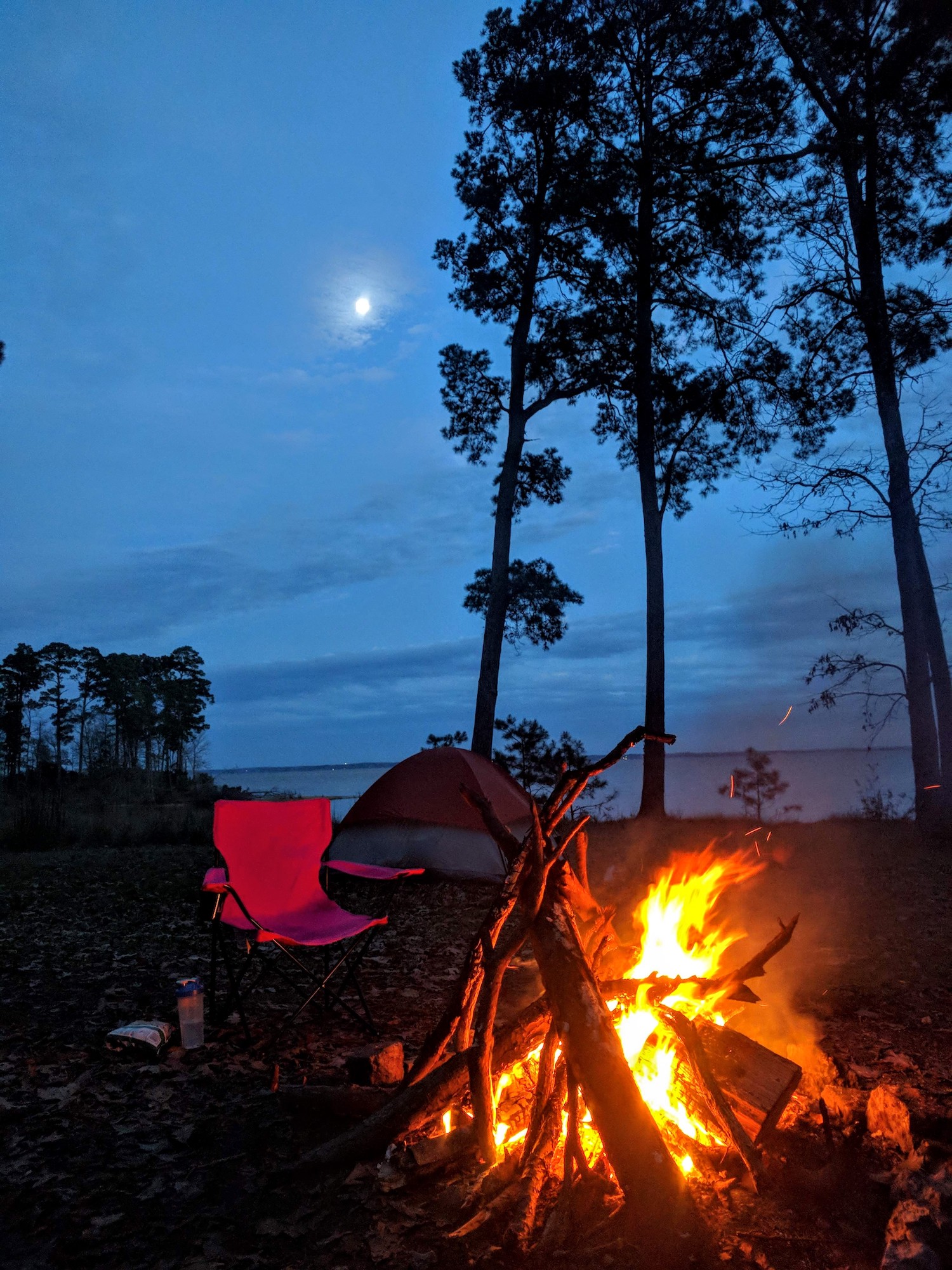 A full moon and a full campfire