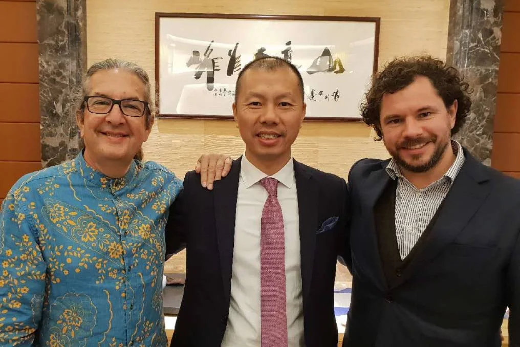 It's high time for tea: The Tea House and Gallery's Stephen Carrol, with Mr Yang, and Owen Terry.