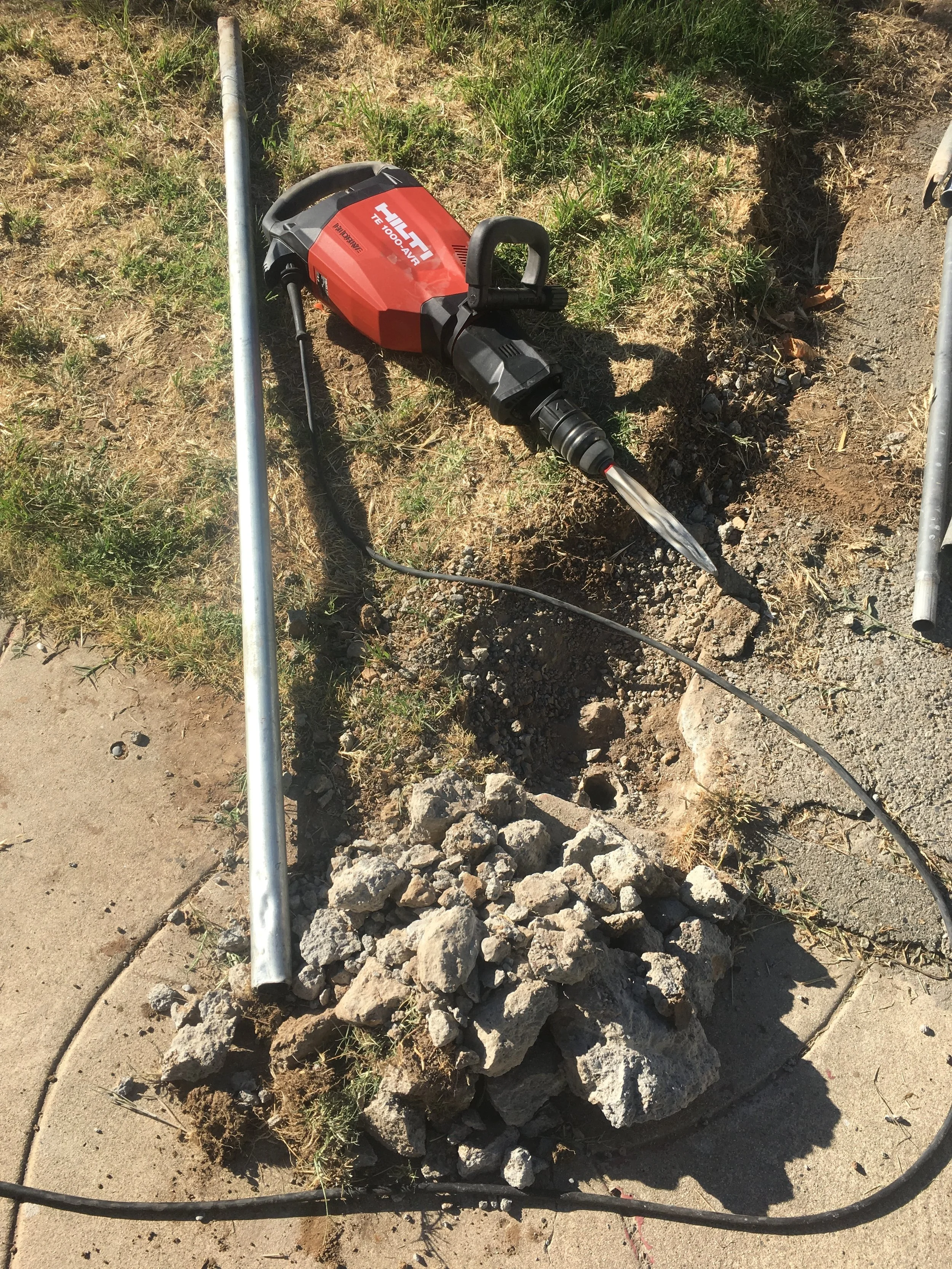 That's the pile of concrete (about half of it) that I removed from ONE of the holes!