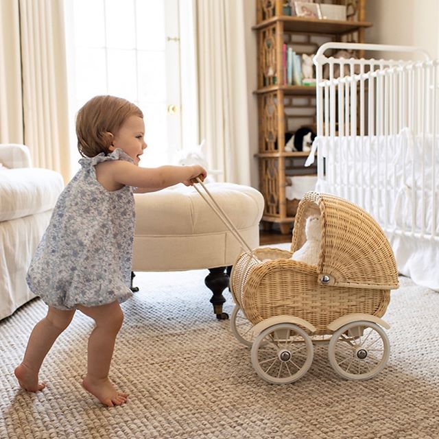 Our favorite little client enjoying her beautiful room! .
.
.
.
.
#whitedecor #nurserydecor #nursery #babydecor #smallspacesquad #nurseryinspo #interiordesign #kidsroom #kidsinteriors  #girlsroom #legler #pram #leeindustries