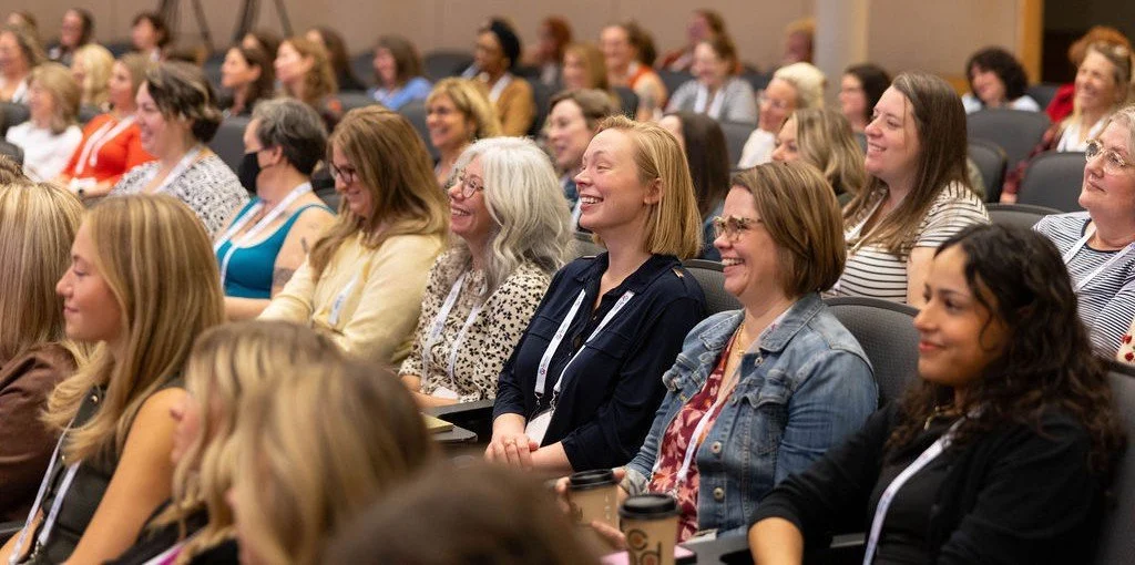 Conference attendees enjoying the keynote speaker