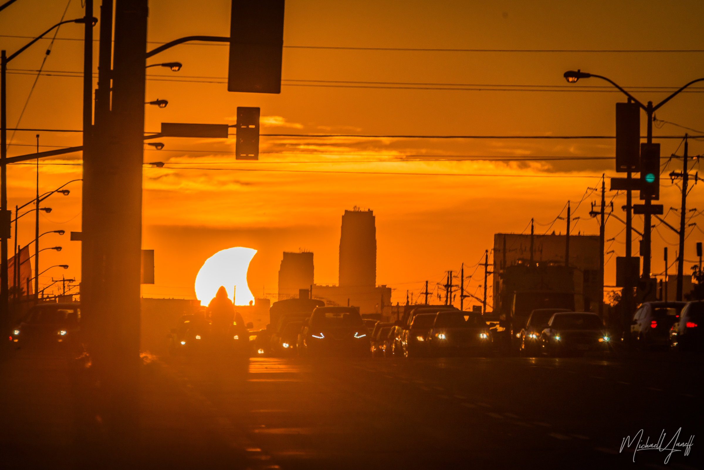 Partial Solar Eclipse over Eglinton Avenue Toronto.jpg