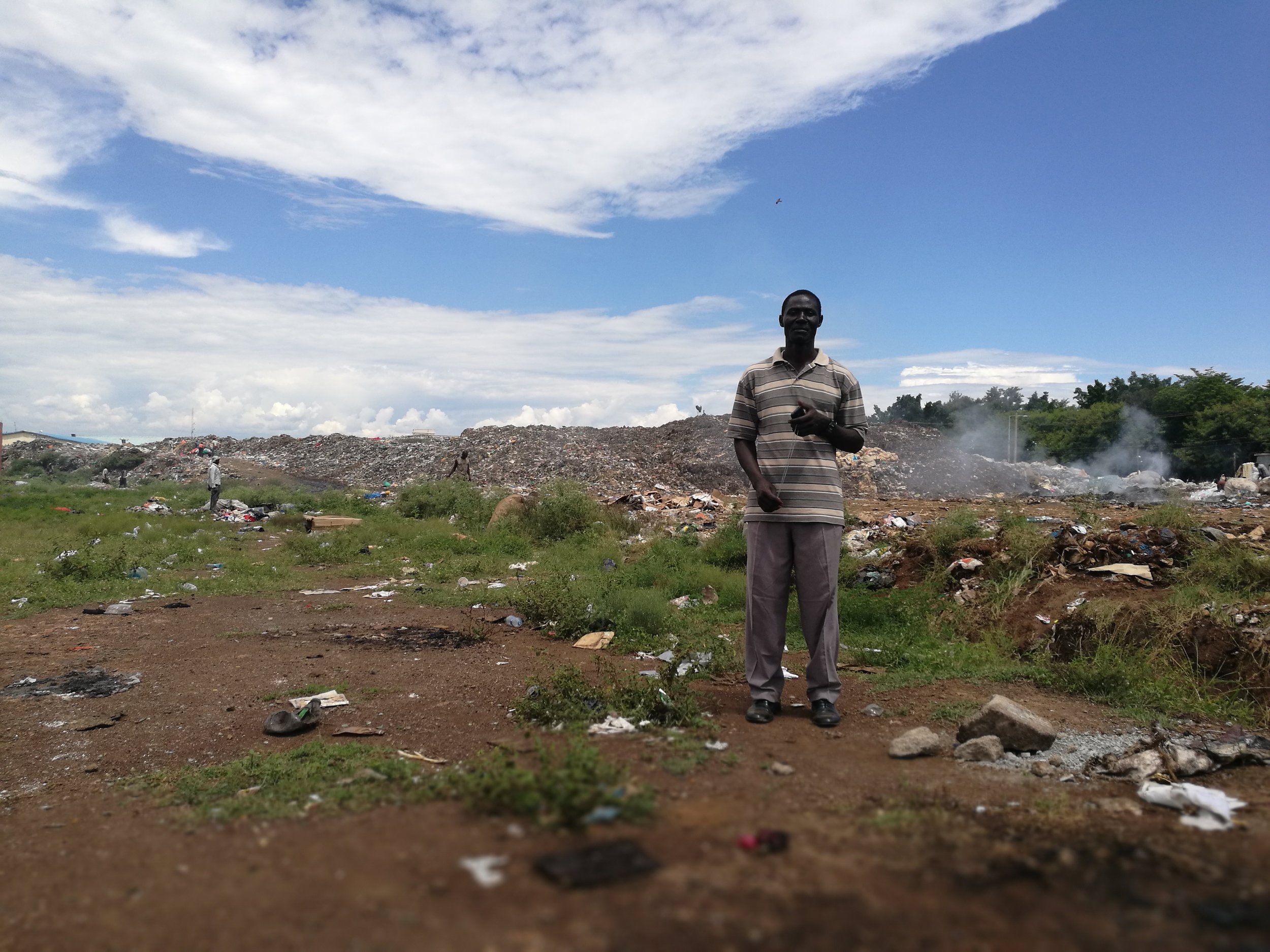 Dumpsite manager John