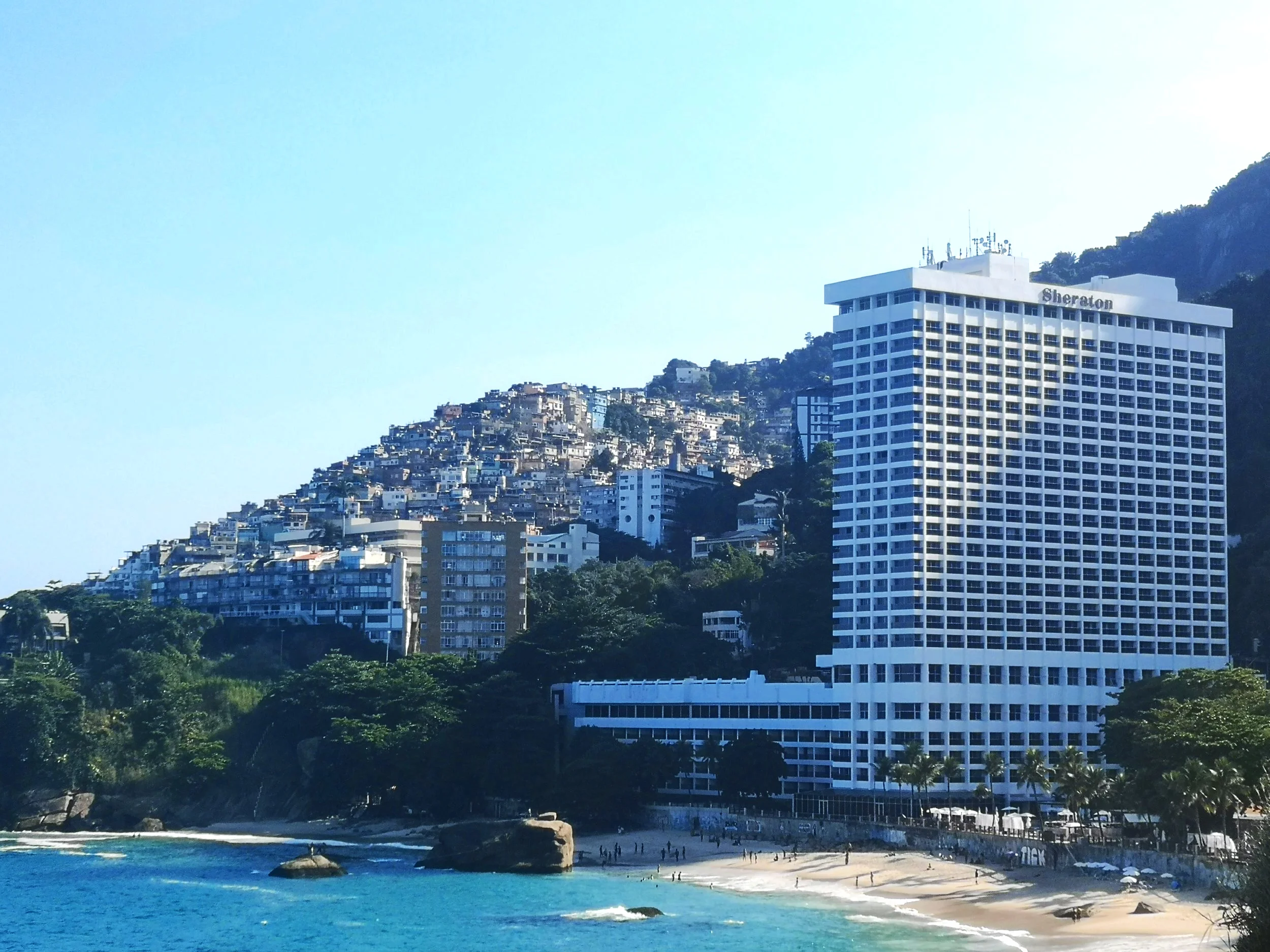 Bairro Vidigal, a favela in the south of Rio, is built on the slope of Morro Dois Irmãos. It has a stunning view over Ipanema beach, the Atlantic Ocean and is bordered by the rich neighbourhood Leblon.