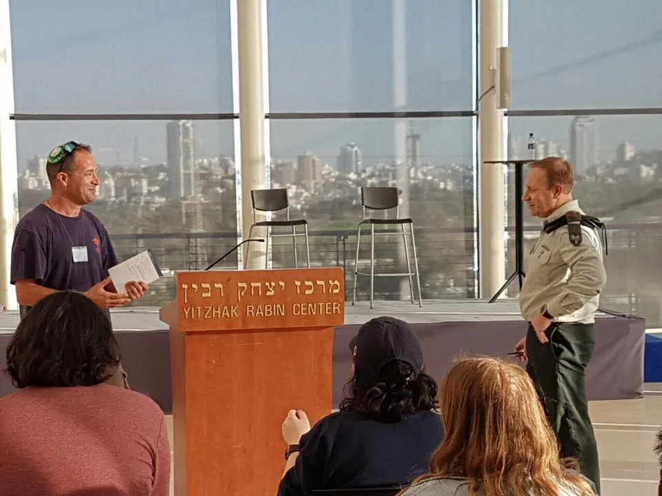 Tuvia Book with IDF Spokesman Peter Lerner, talking about the challenges of defending Israel's military to the international press.