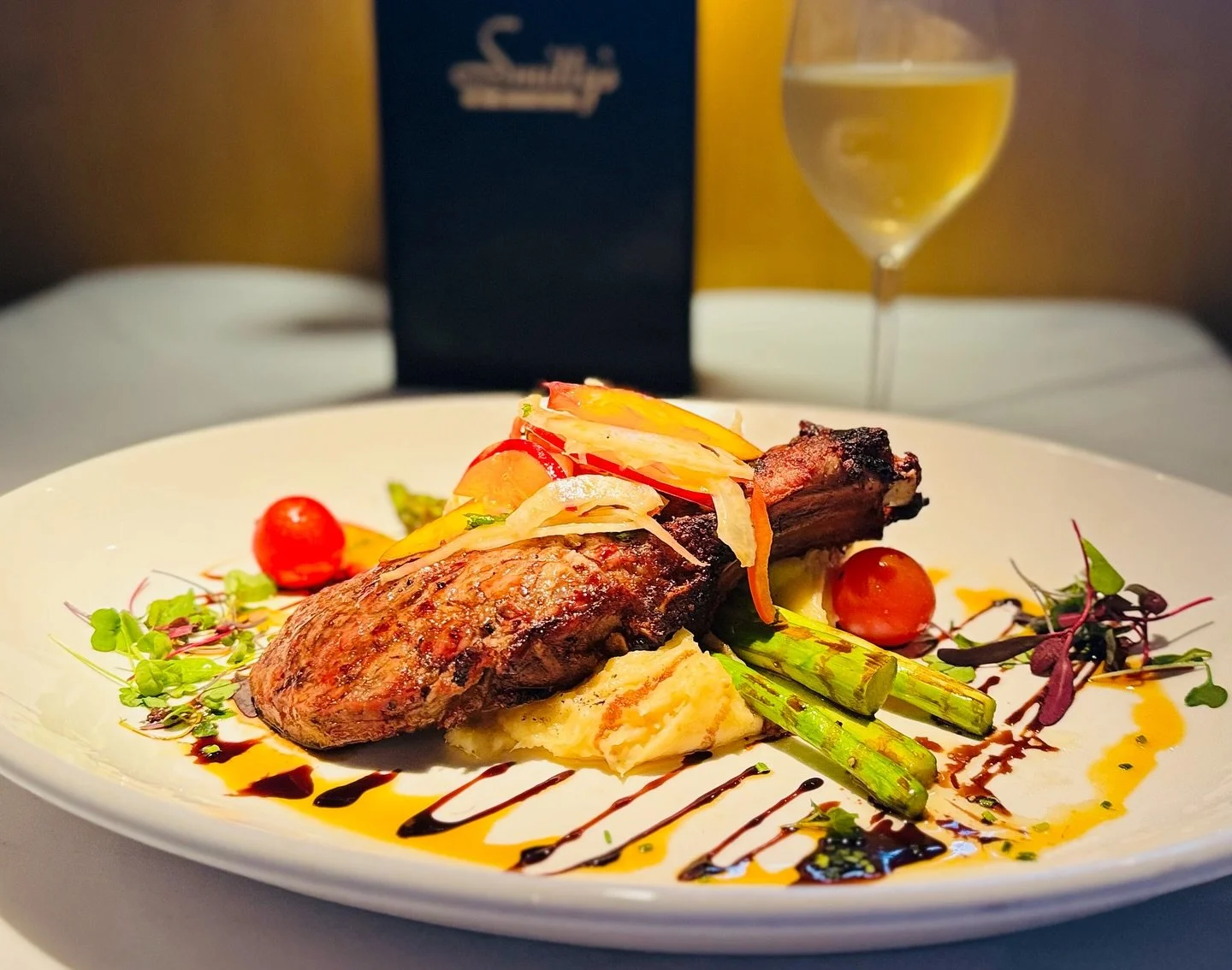 Savor the bold flavors of our Grilled Kurobuta Pork Chop &mdash; a 16oz bone-in masterpiece served with velvety parsnip pur&eacute;e, saut&eacute;ed asparagus, balsamic glaze, and finished with a nectarine-fennel relish &amp; a hint of chili oil.

Or