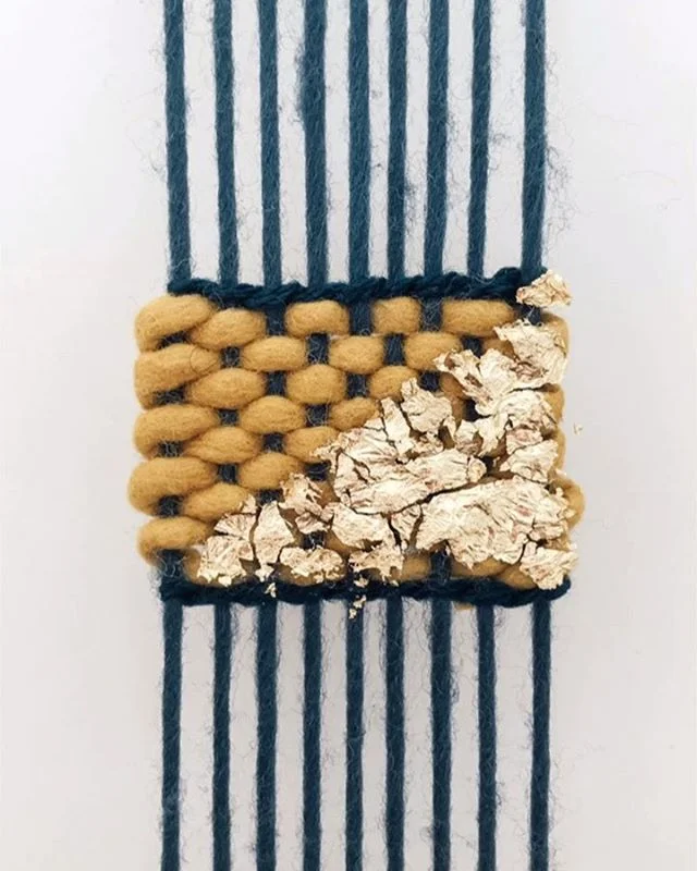 DIY FRIDAY // Gold Leaf
⠀
Yarn is my love language... but gold leaf is what dreams are made of, right!? This is a bit of an unconventional diy that’s been requested many times. If you want to add some shine to your project don’t be scared - just try it out!

You can learn more about weaving by joining my online video classes on my website or DM me for help getting started!⠀ Save this post and follow #hhdiyfriday for more tutorials 😘
⠀
1. If you want a clean line, or don’t want the gold leaf to cover certain areas, use a lightly sticky paint tape to tape them off.
2. Dab a craft or fabric glue on top of your rows of weft and then use a brush or stick to spread it around into a thin layer. The parts that the glue touches will be where the gold leaf sticks!
3. Let the glue get a bit tacky and then press your sheet of gold leaf over the area. Use your fingers to press down - the gold leaf will stick right onto the glue! I’ve tried this method with loose gold leaf but it doesn’t work as well as a sheet.
4. If you want the gold leaf to have more coverage, let it dry completely. If you want more of a chippy effect, brush it off while the glue is just slightly still tacky. Use your finger, a popsicle stick or a brush to remove any excess gold leaf. 
5. Remove the tape and your gold leaf will continue drying and shining!
⠀
⠀
What kind of creative projects do you have planned this weekend?⠀
XO⠀
Lindsey⠀
.⠀
.⠀
⠀
.⠀
.⠀
.⠀
.⠀
.⠀
#fiberartist #loom #design #fiberart #weaverfever #weaving #woven #weave #weaversofinstagram #handwoven #textiles #love #wool #textileart #makersgonnamake #hhdiyfriday #etsy #yarn #weavingloom #makersmovement #art #weaver #handmade #tapestry #fashion #wallhanging #homedecor #textiledesign #wovenwallhanging