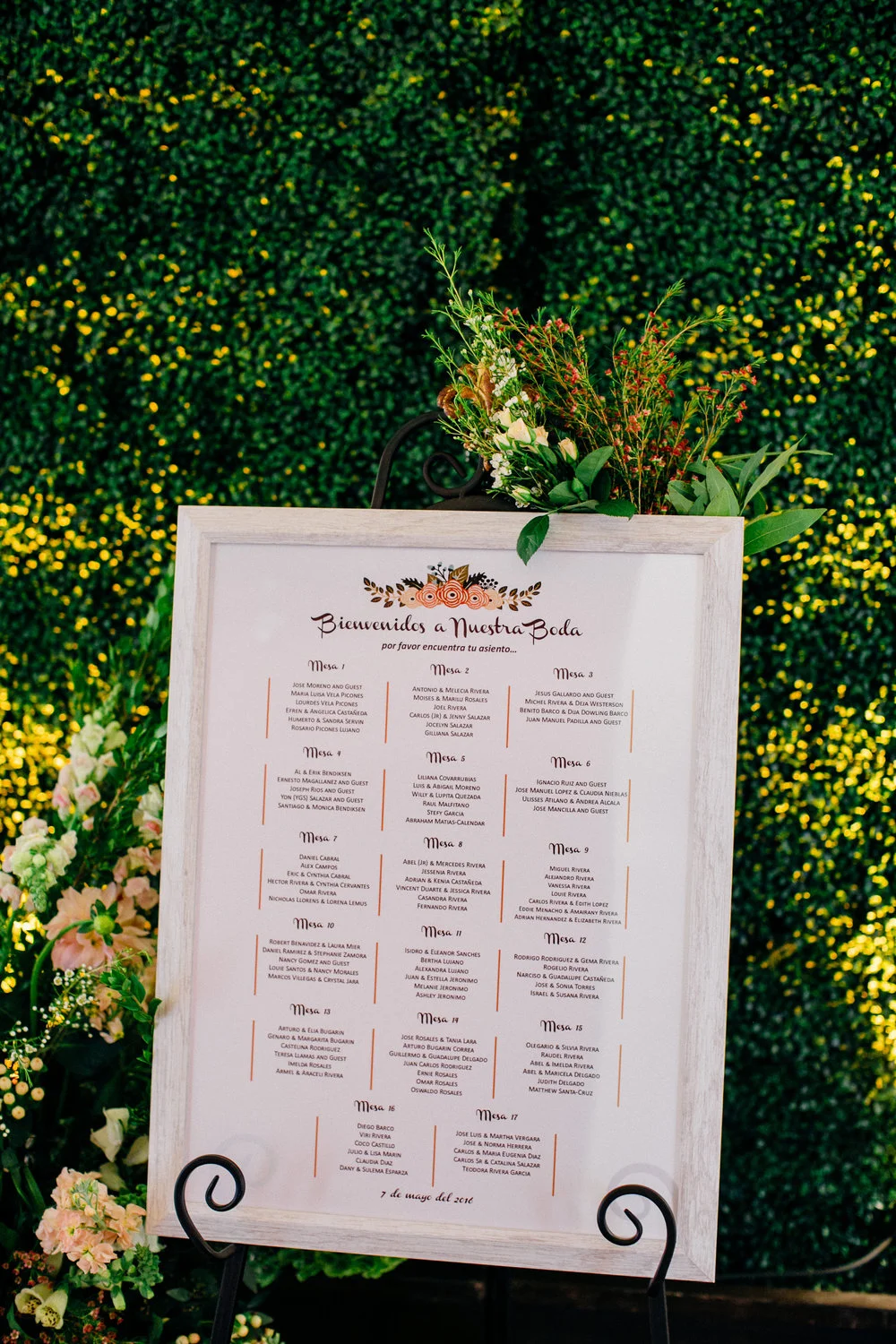 9cfc4-elegant-country-charm-ranch-wedding-seating-chart-flanked-by-flowers.jpg